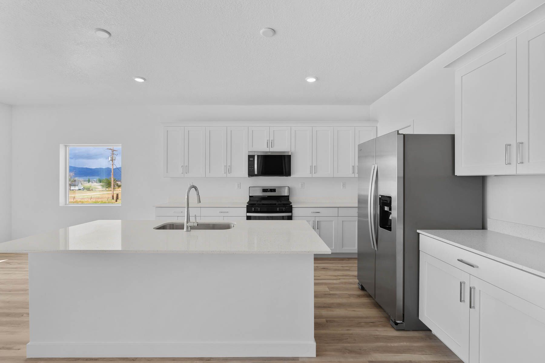The kitchen has a wonderful kitchen island. 