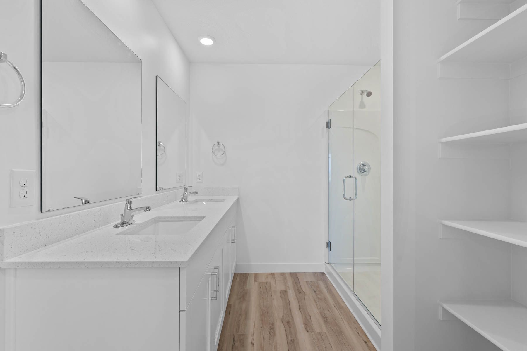 The master bathroom has a sprawling dual-sink vanity.