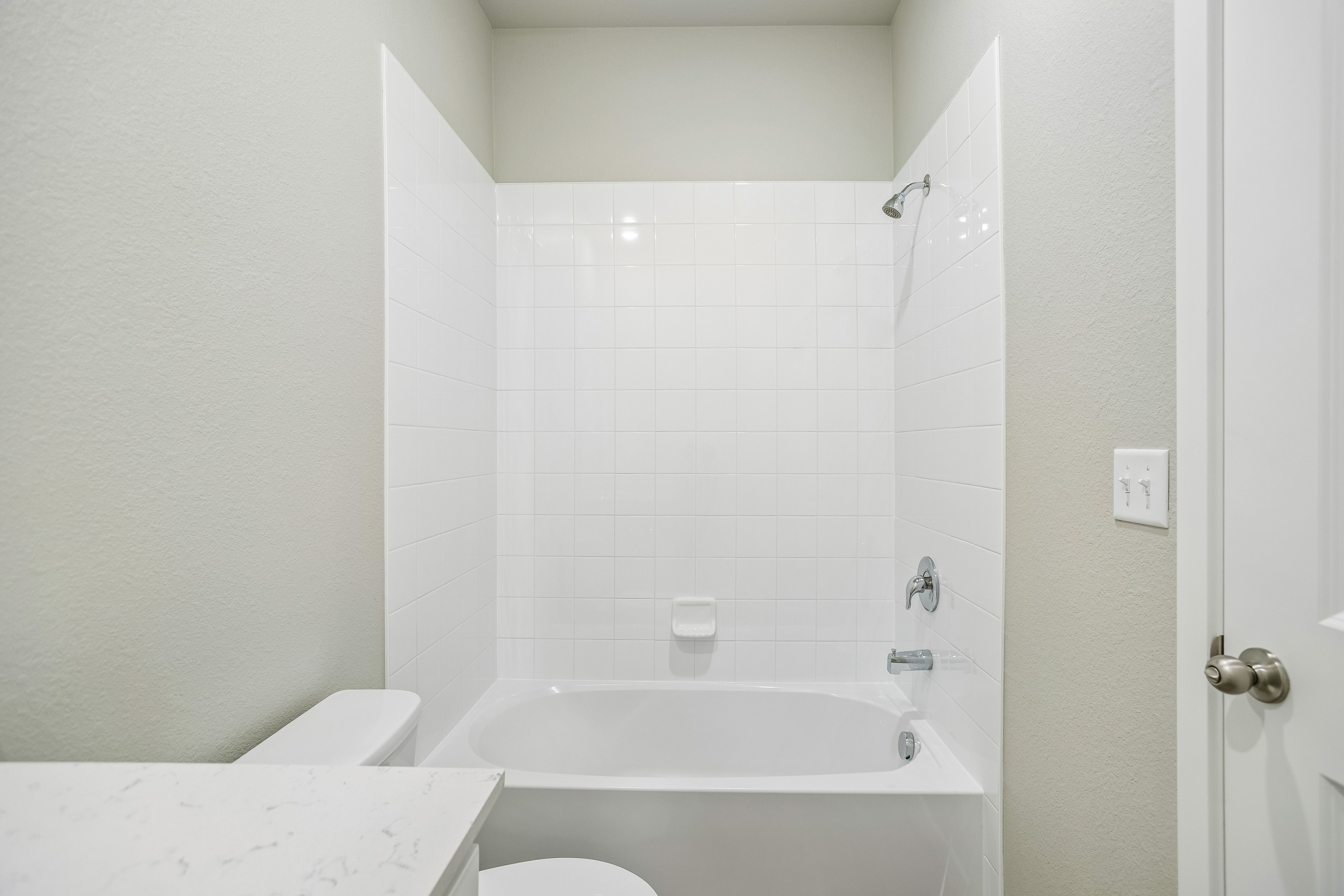 The secondary bathroom has the tub/shower combo.