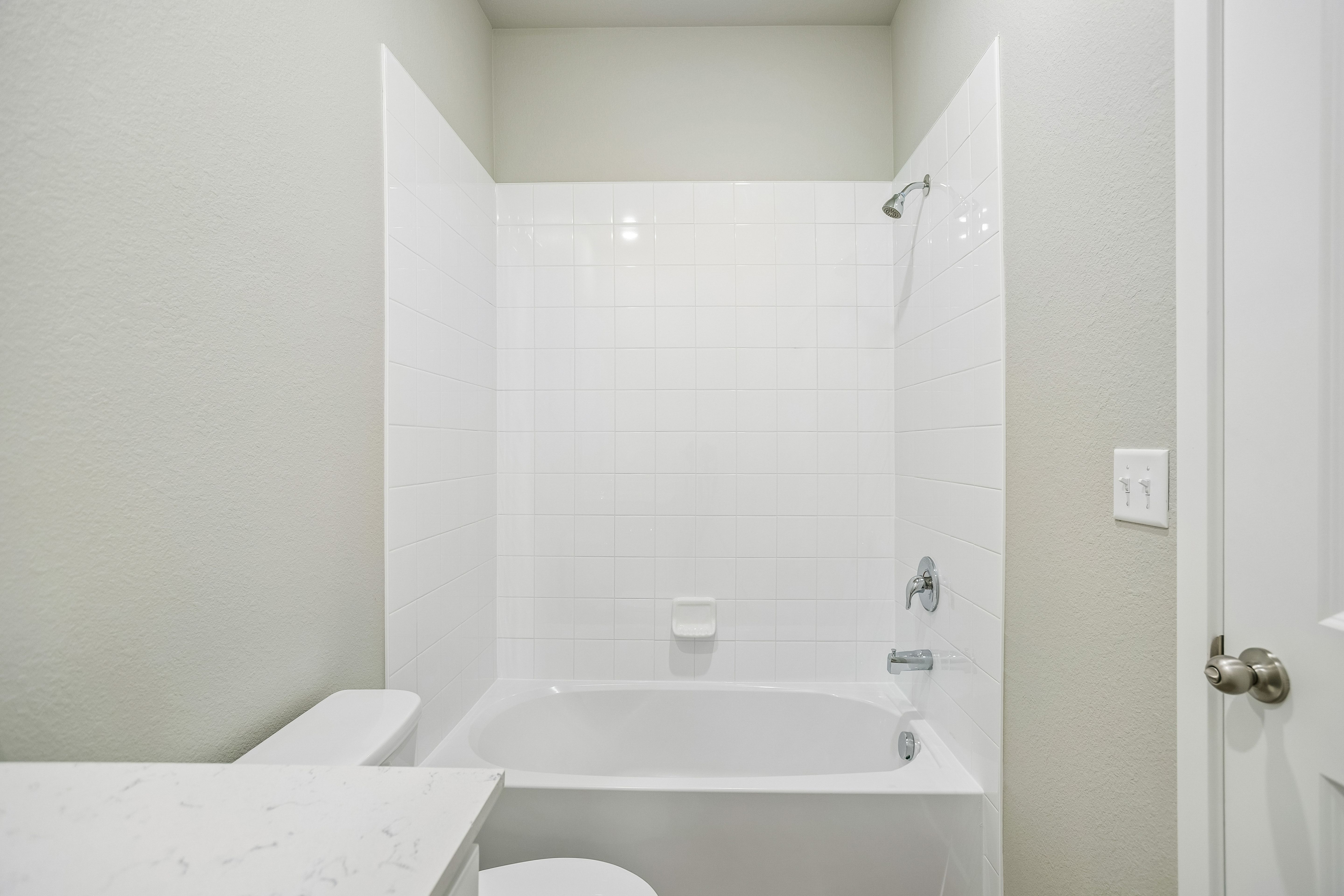 The secondary bathroom has the tub/shower combo.