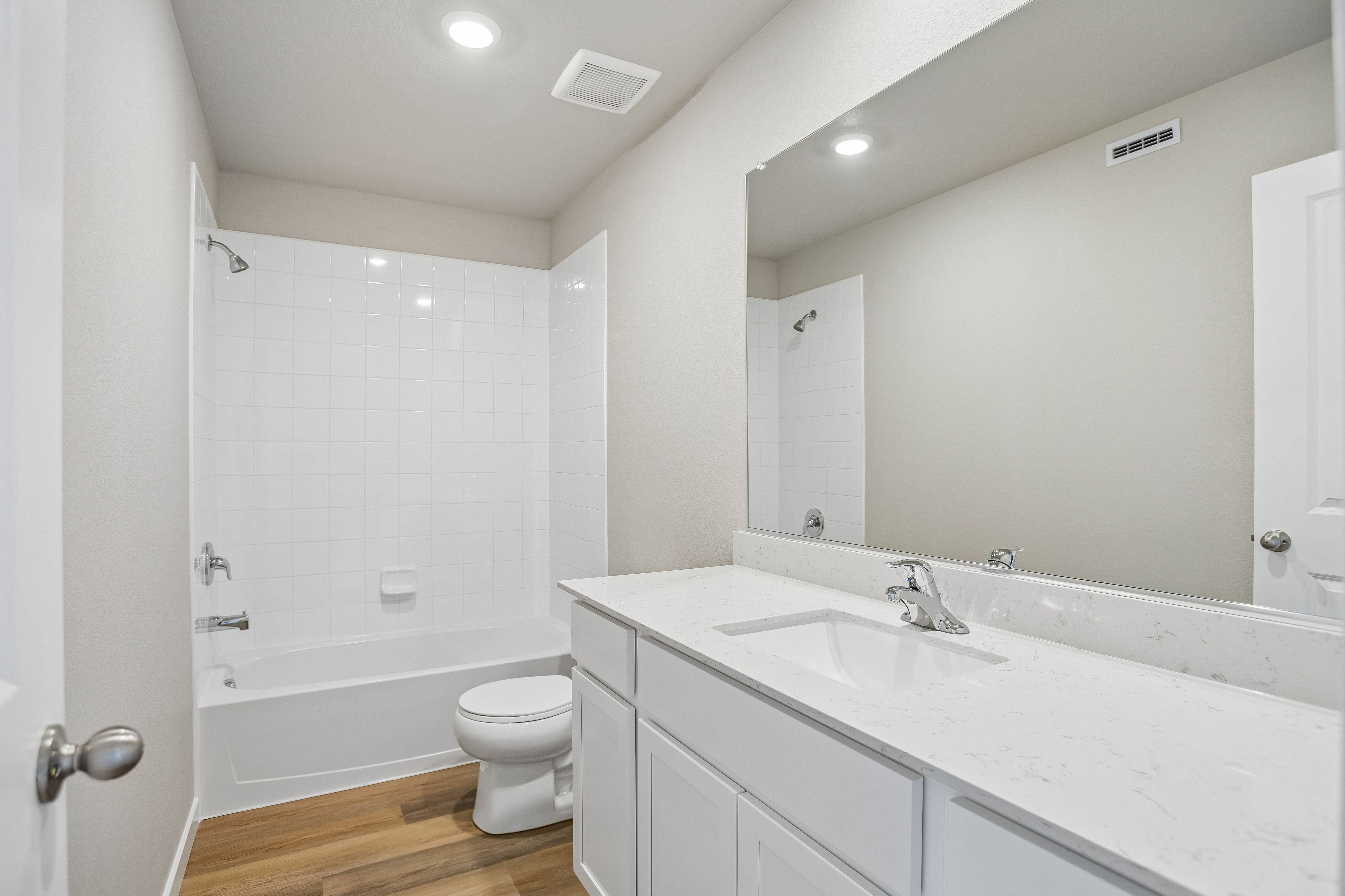 The secondary bathroom has the tub/shower combo.