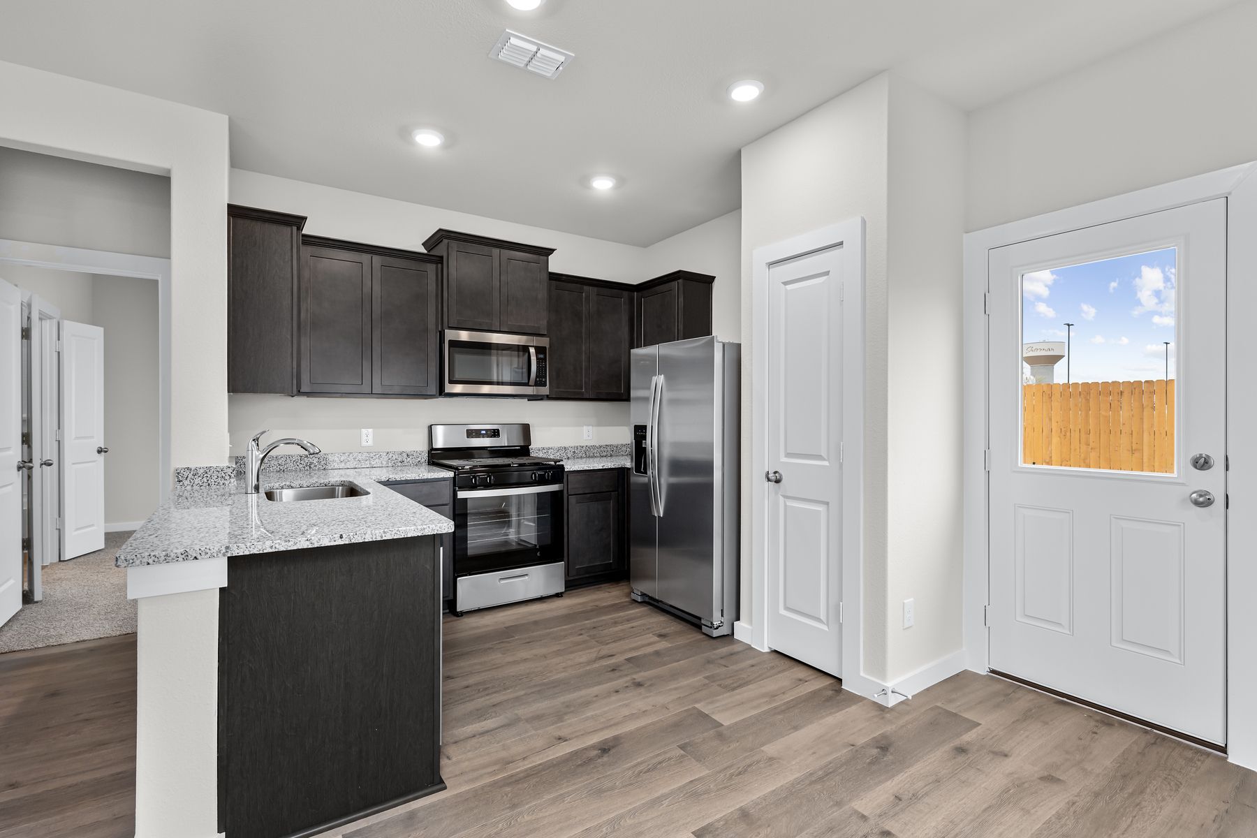 The dining room sits right off of the kitchen.