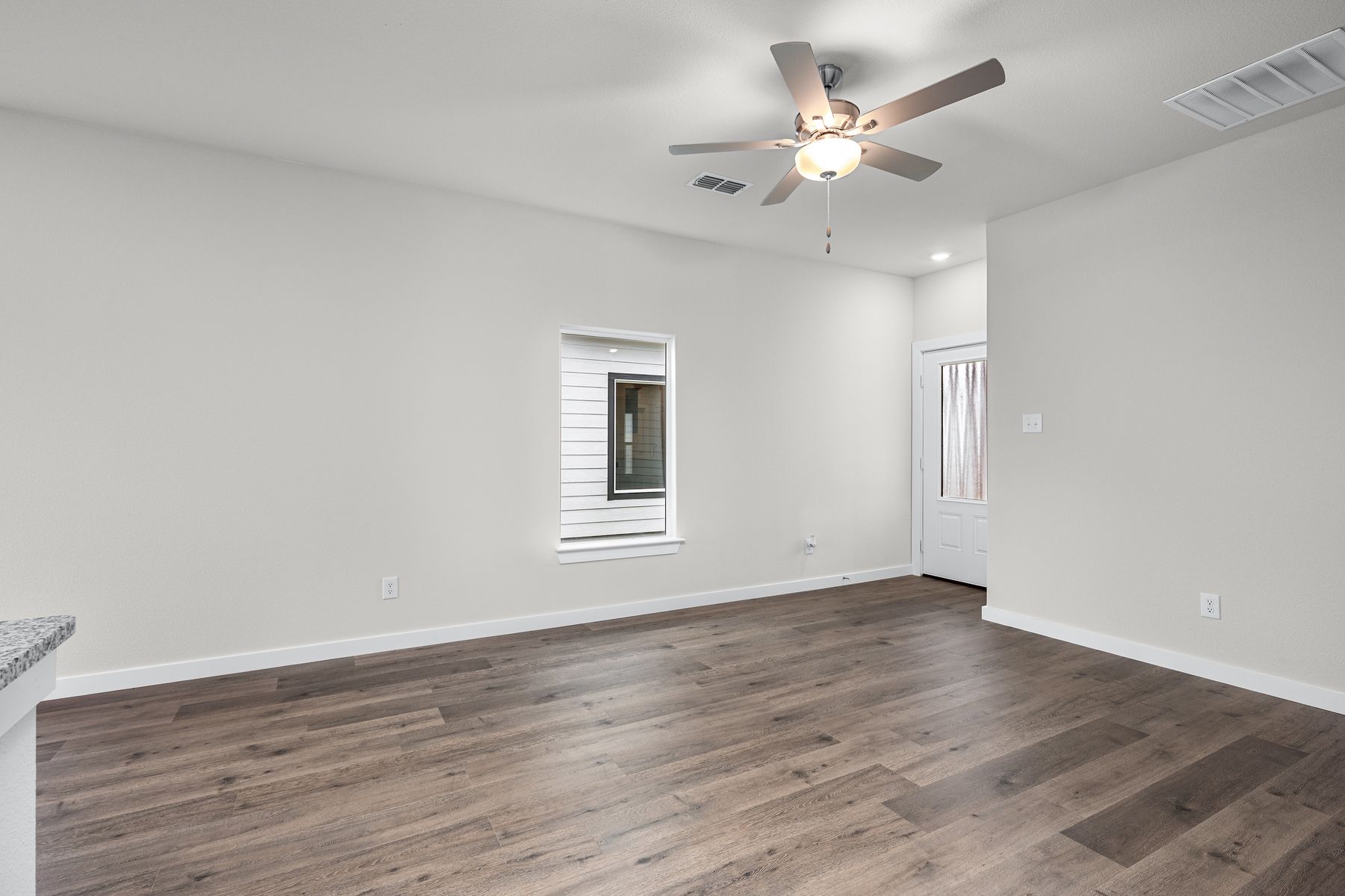 The family room has windows that let in great, natural light.