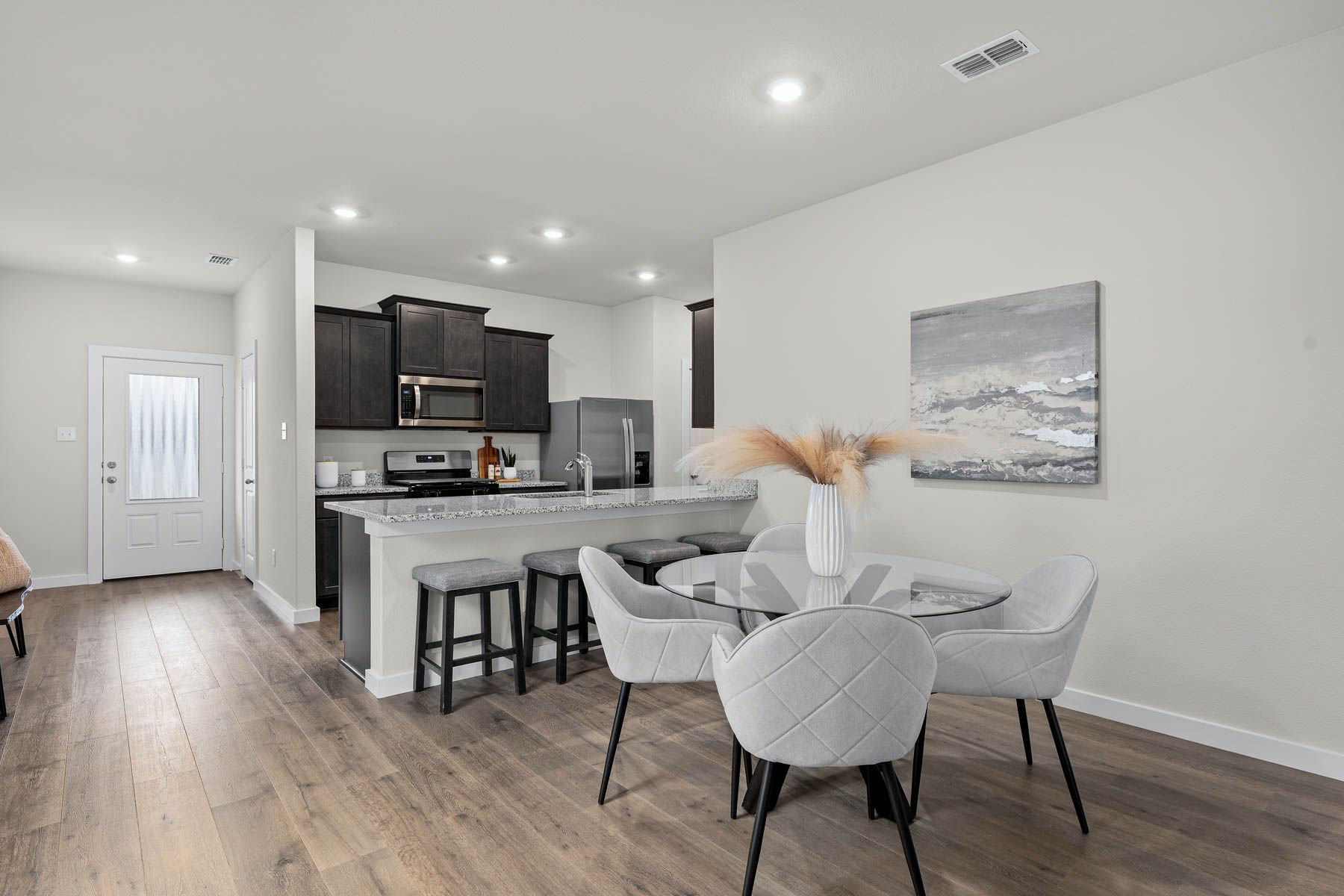 The dining room sits right off of the kitchen.