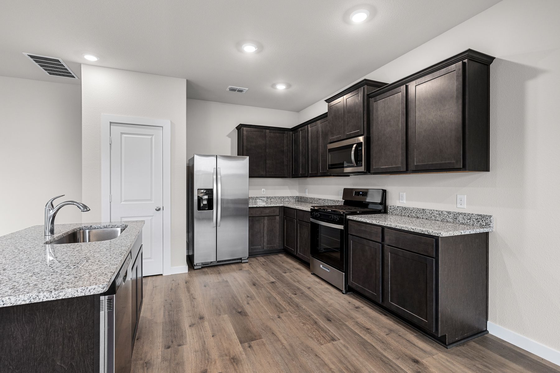 The kitchen has energy-efficient appliances.