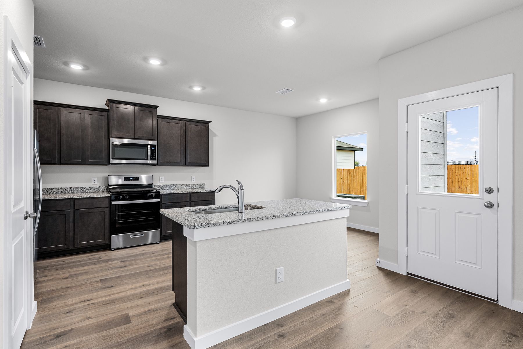 The kitchen has a convenient kitchen island.