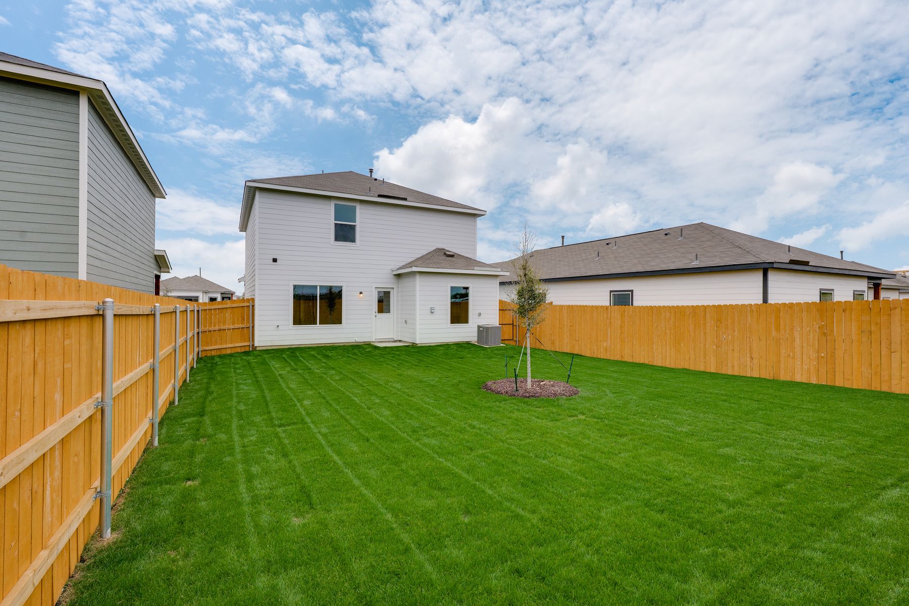 The back yard of the Colorado is fully fenced-in.