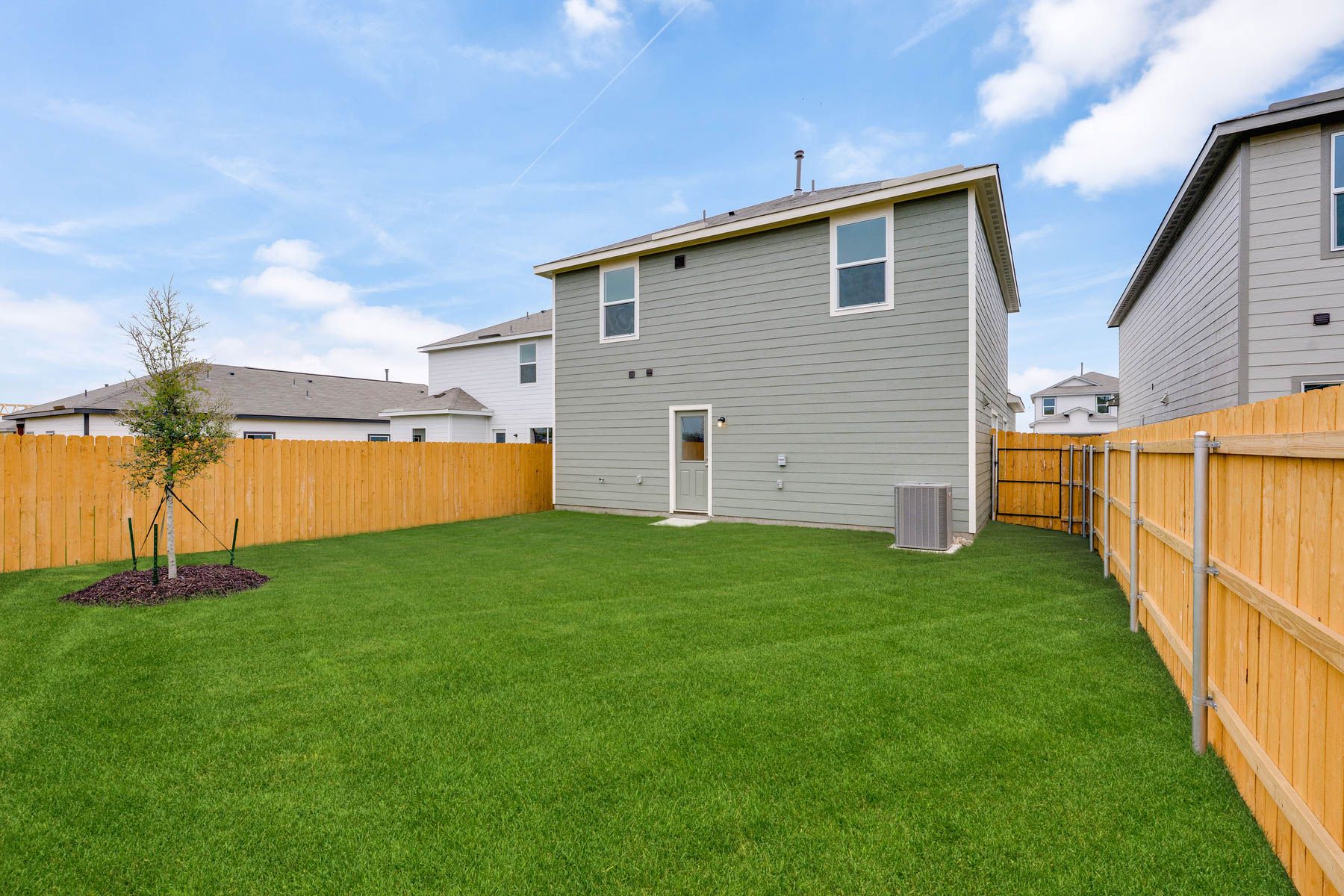 The back yard of the Primrose is fully fenced-in.