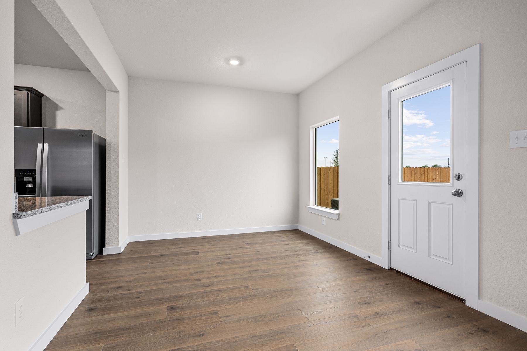The dining room sits right off of the kitchen.