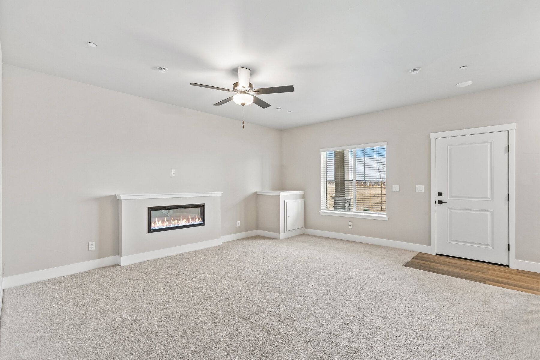There is an additional family room on the first floor with an electric fireplace.
