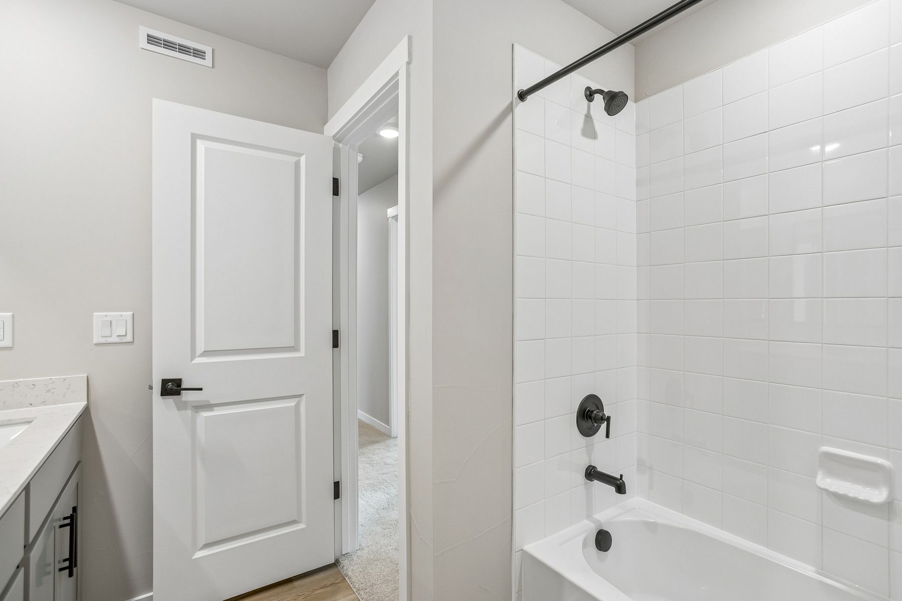 The secondary bathroom has the tub/shower combo.