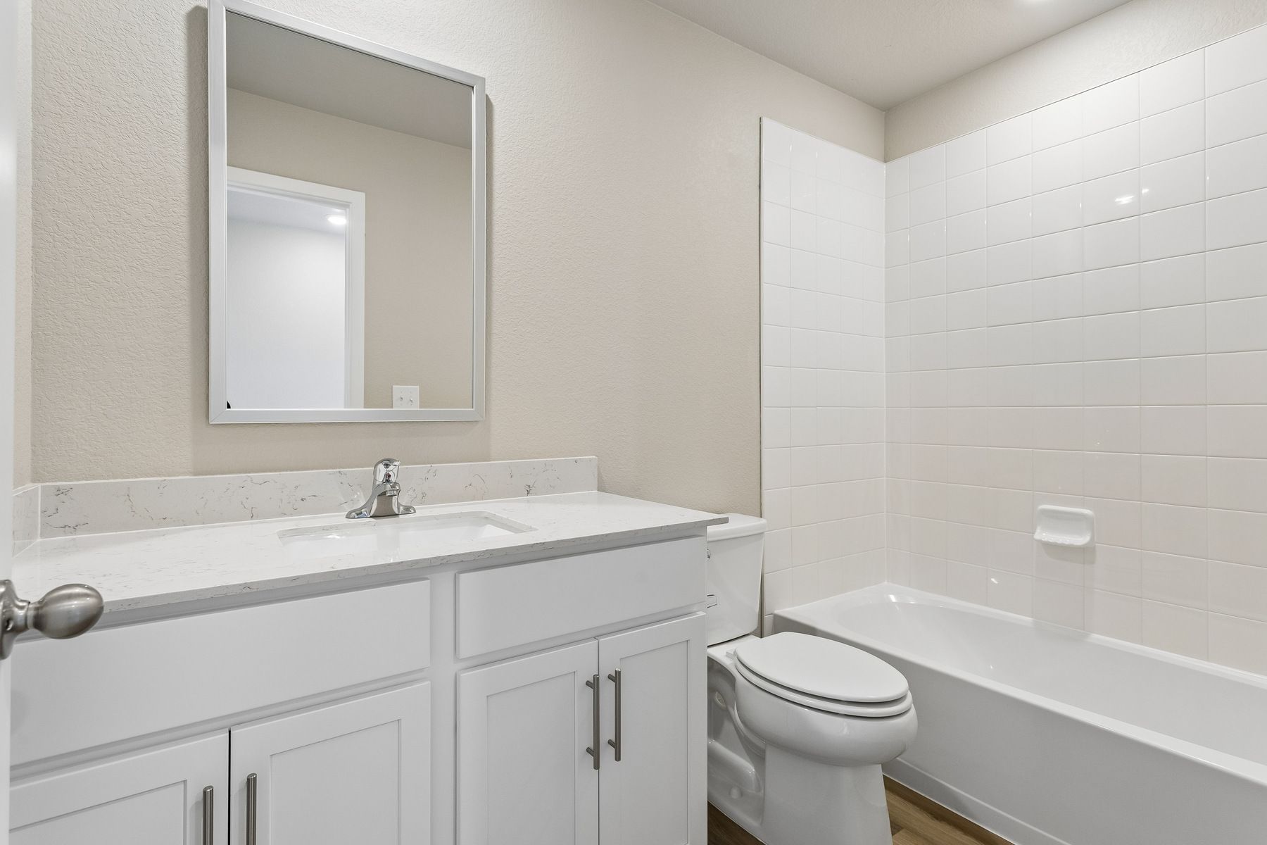 The secondary bathroom has the tub/shower combo.