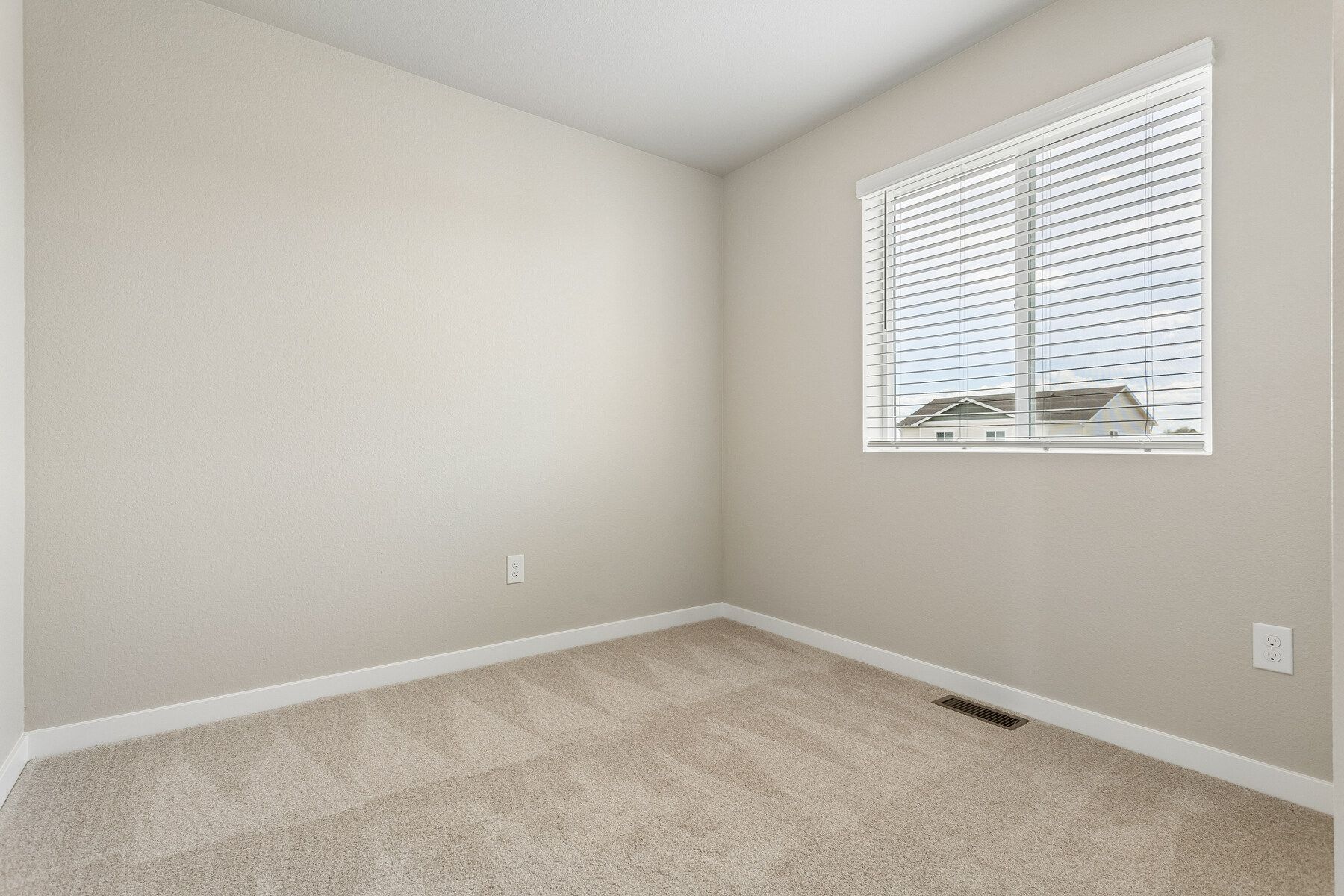 The secondary bedrooms have carpet.
