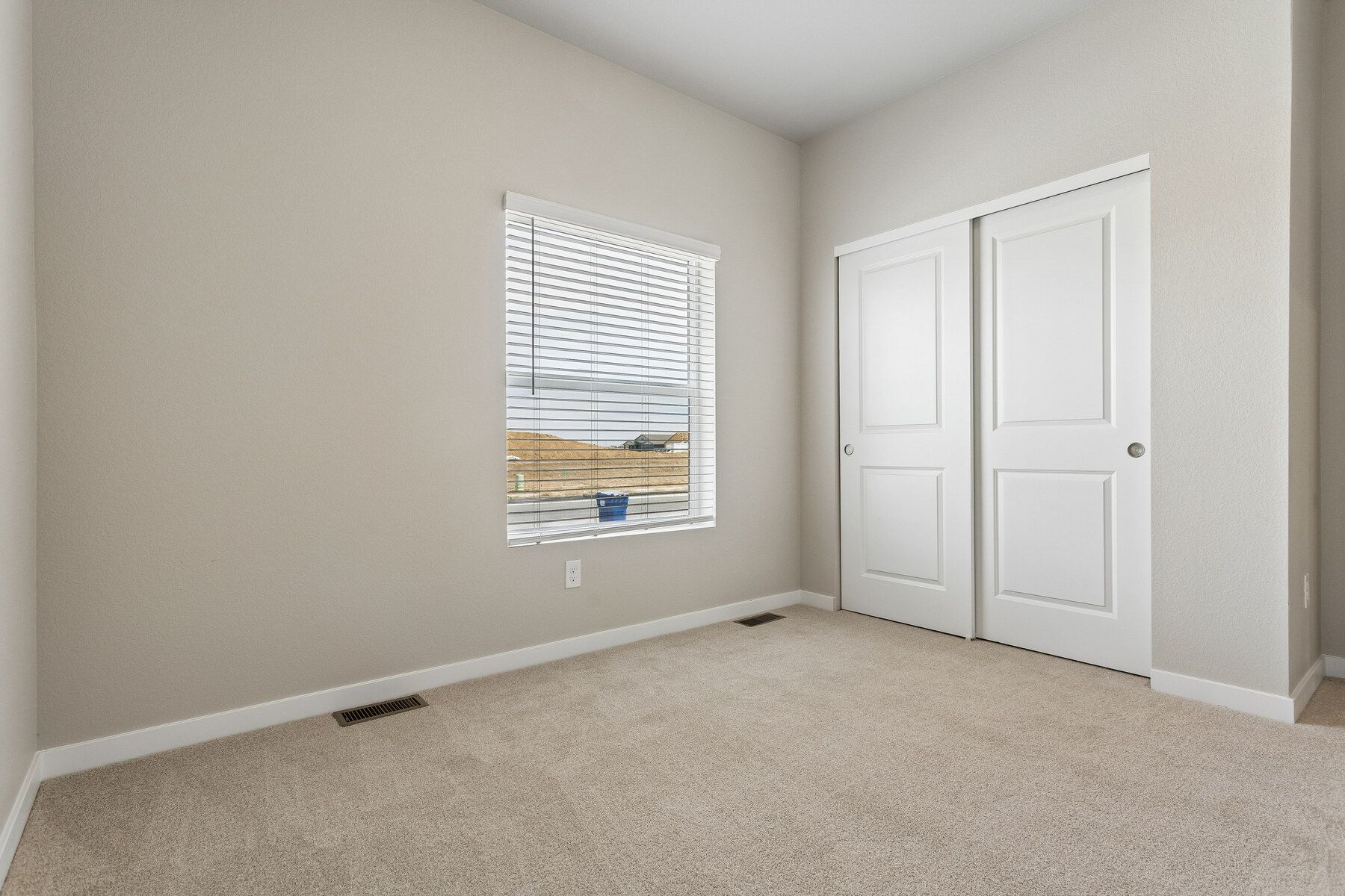 The secondary bedrooms have carpet.