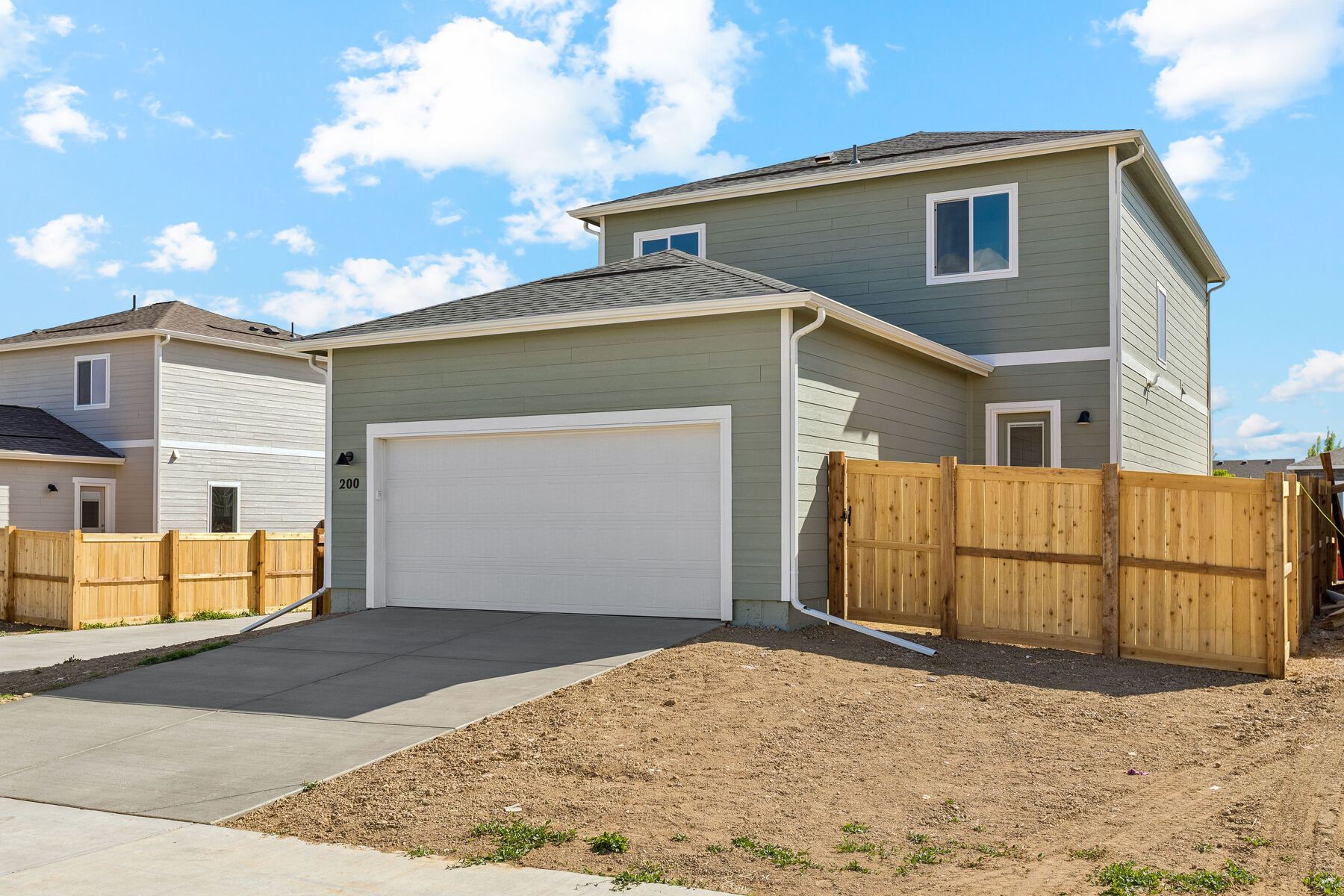 The garage is in the back of the home.