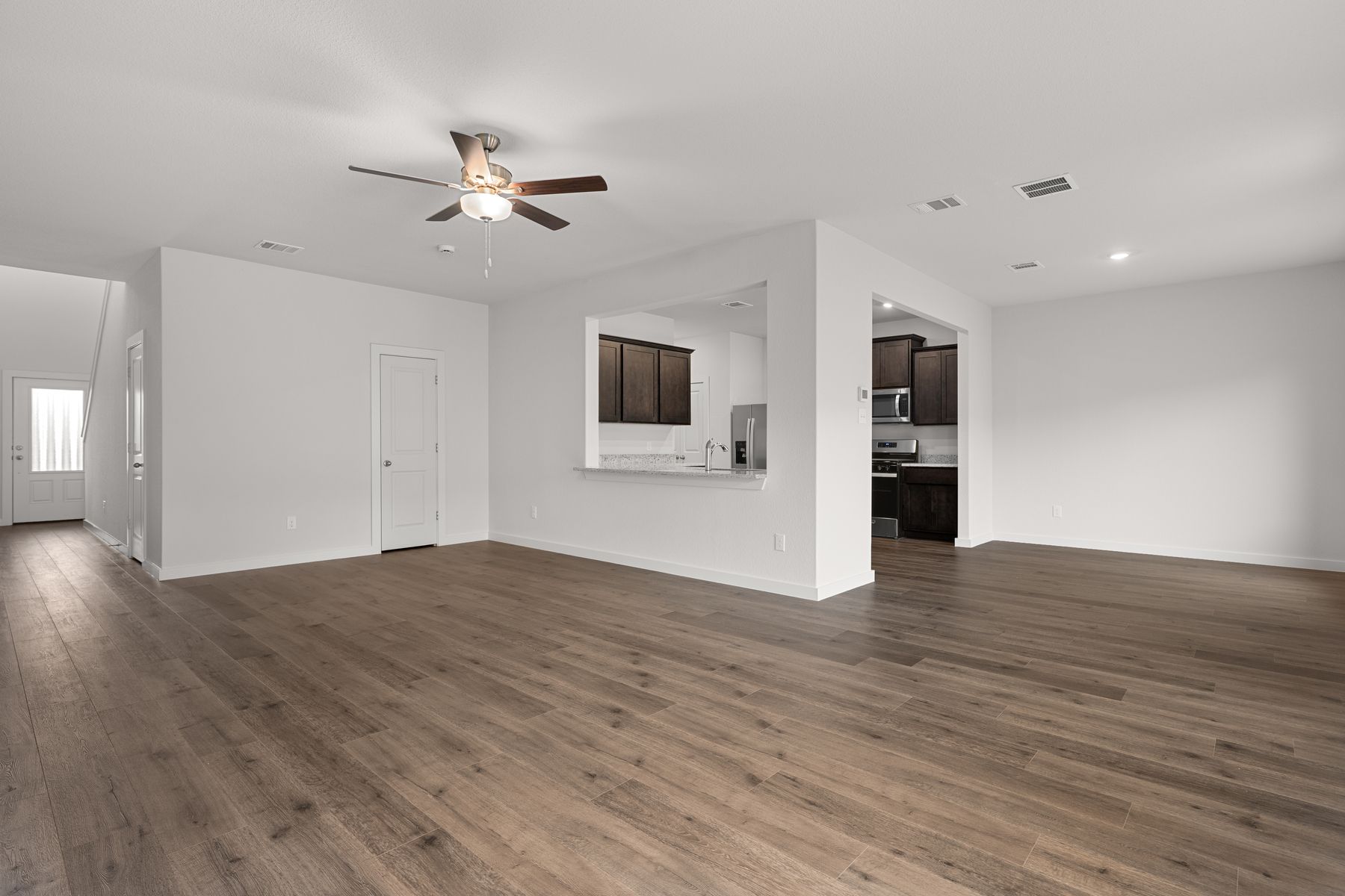 The family room sits right off of the kitchen and living room.