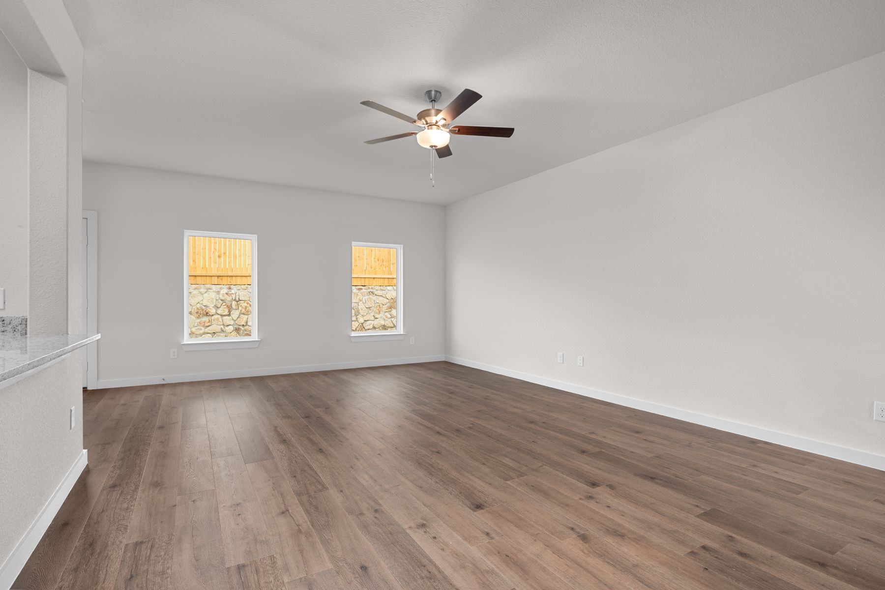 The family room has three large windows that let in great, natural light.