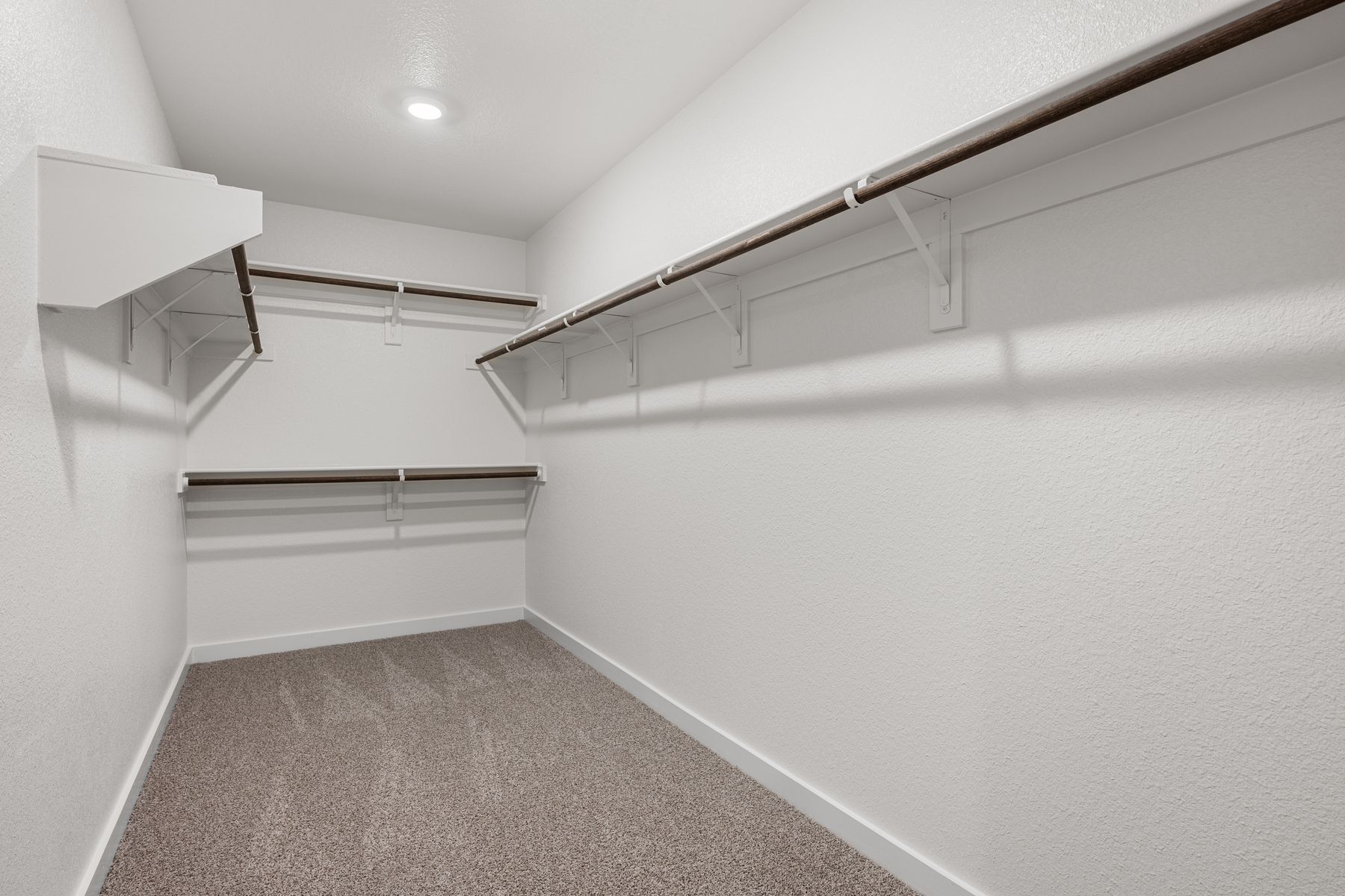 The master suite has a large walk-in closet.