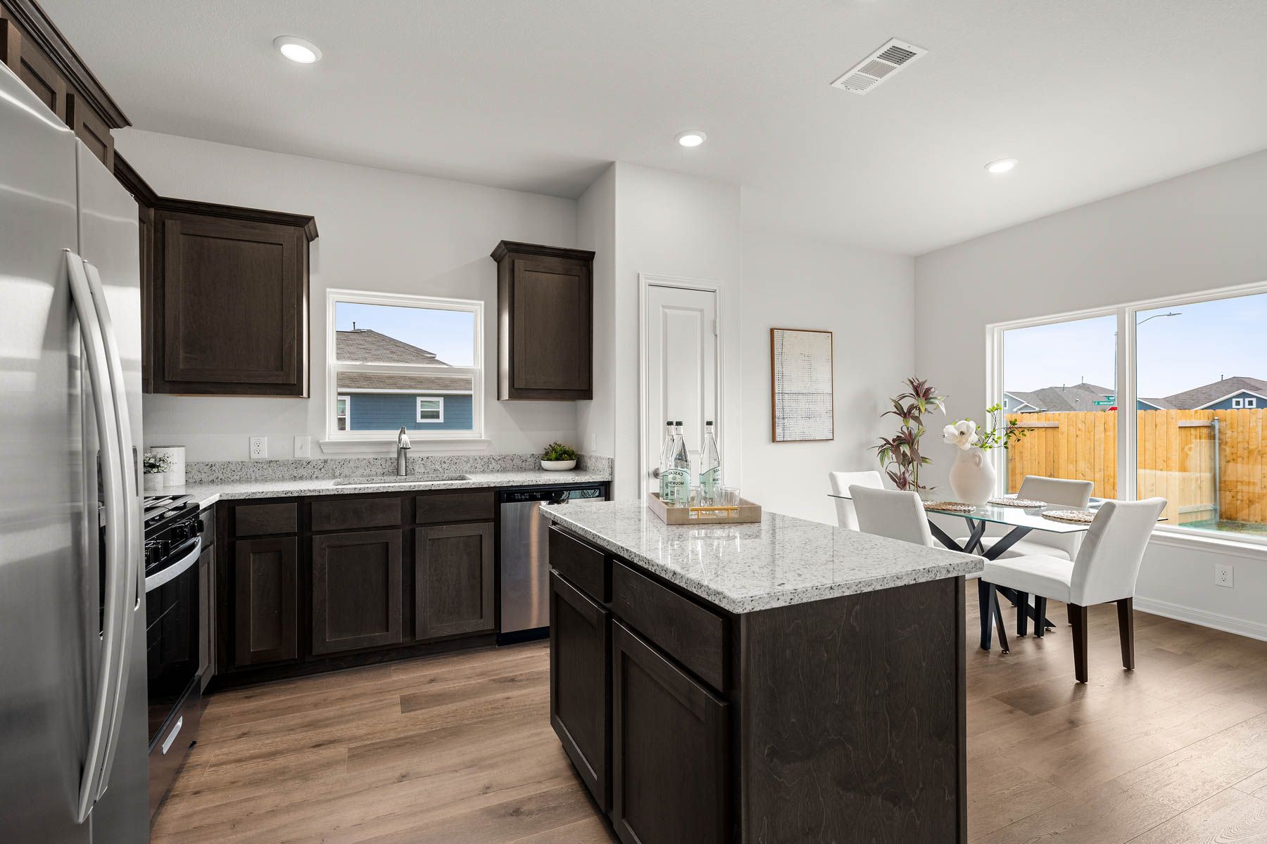 The dining room sits right off of the kitchen.