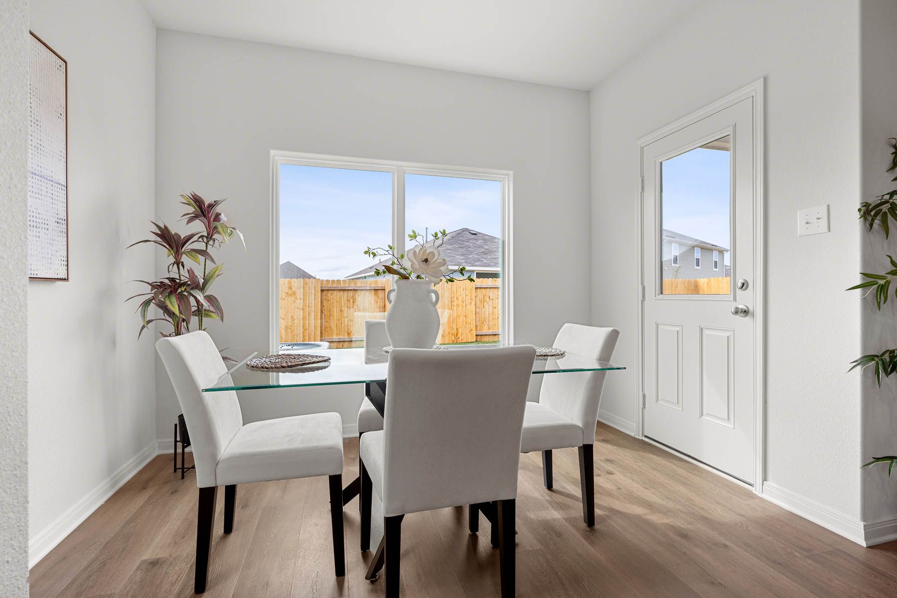 The dining room has a large window that lets in great, natural light.