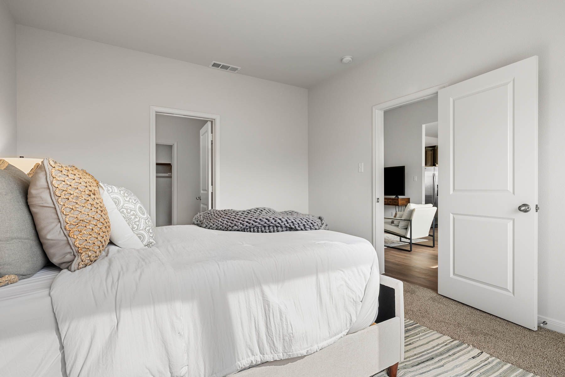 The master suite has a large bedroom, ensuite bathroom and walk-in closet.