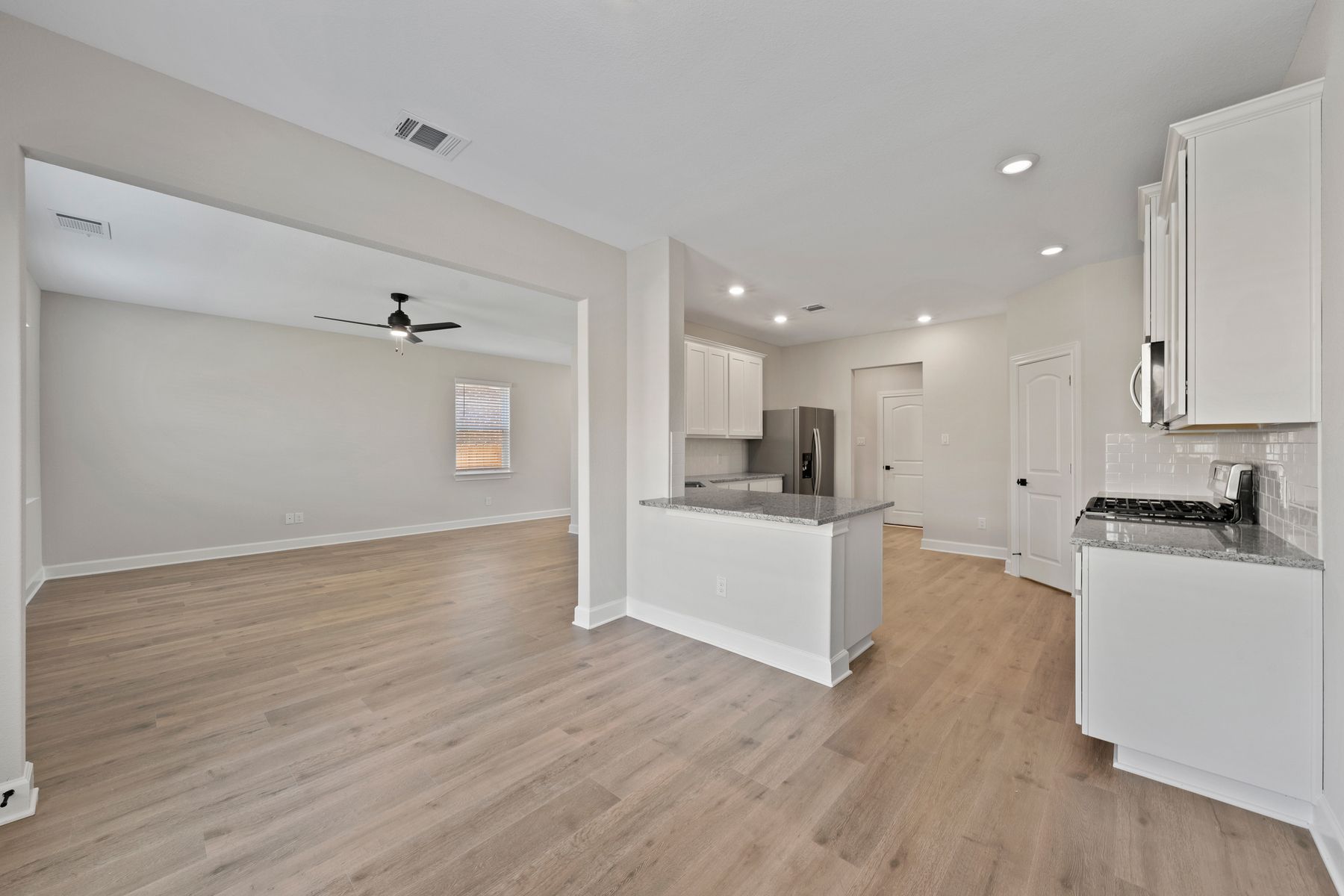 The dining room sits right off of the kitchen.