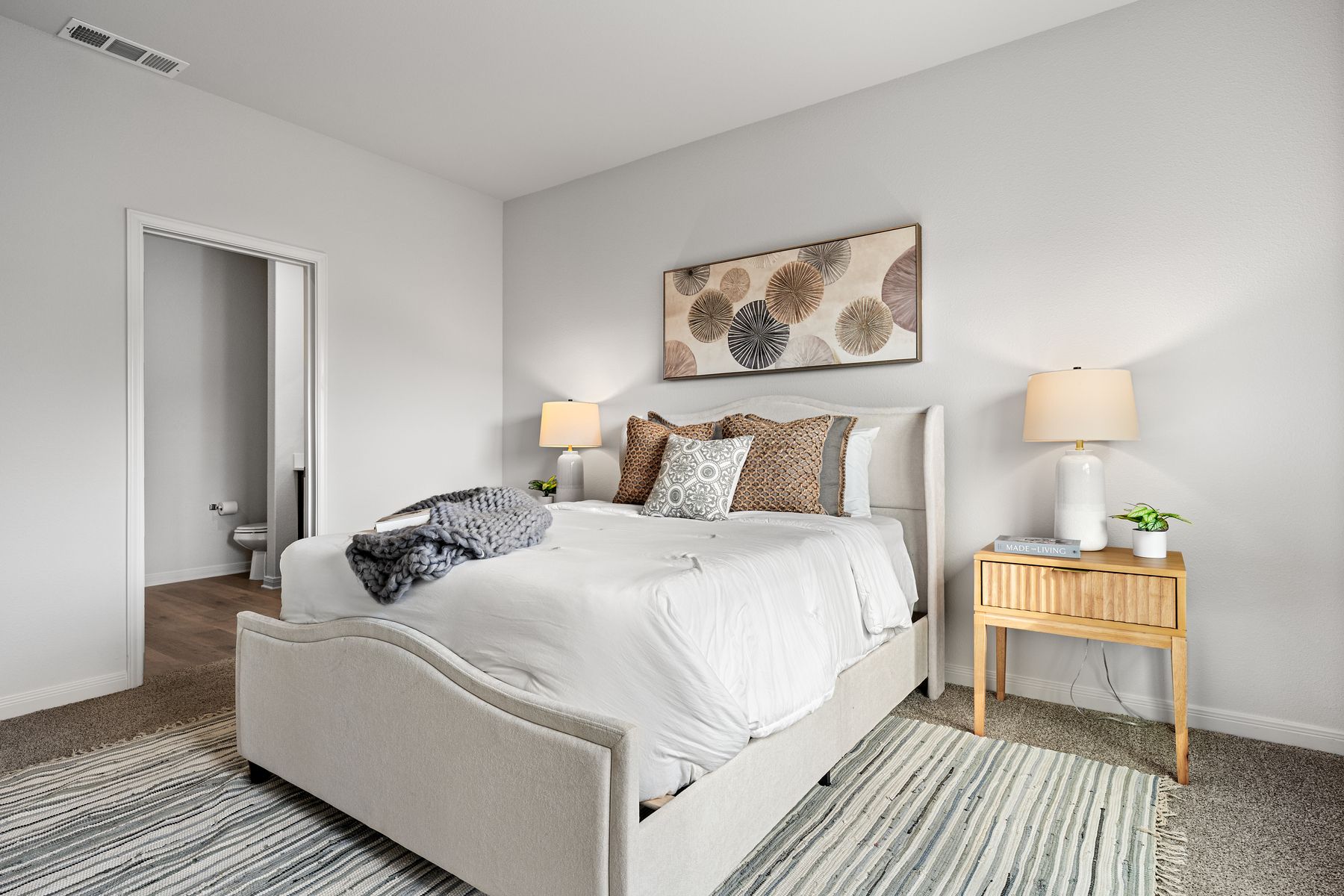 The master suite has a large bedroom, ensuite bathroom, and walk-in closet.