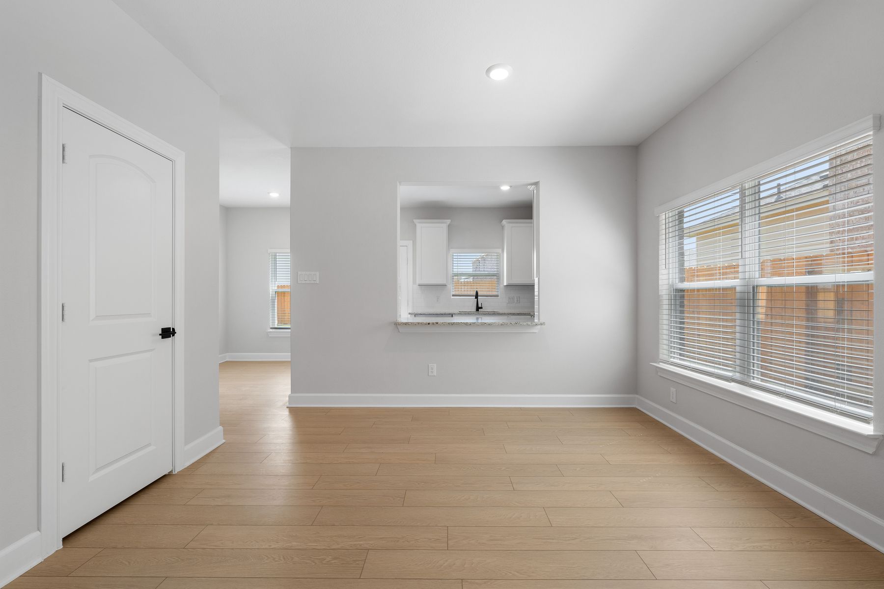 The spacious family room sits right off of the kitchen.