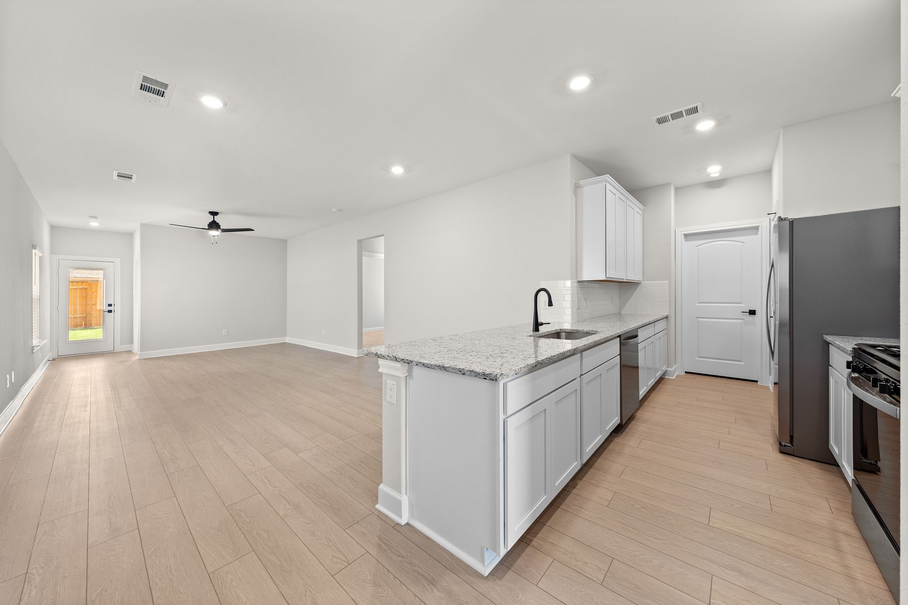 The kitchen has a convenient breakfast bar. 