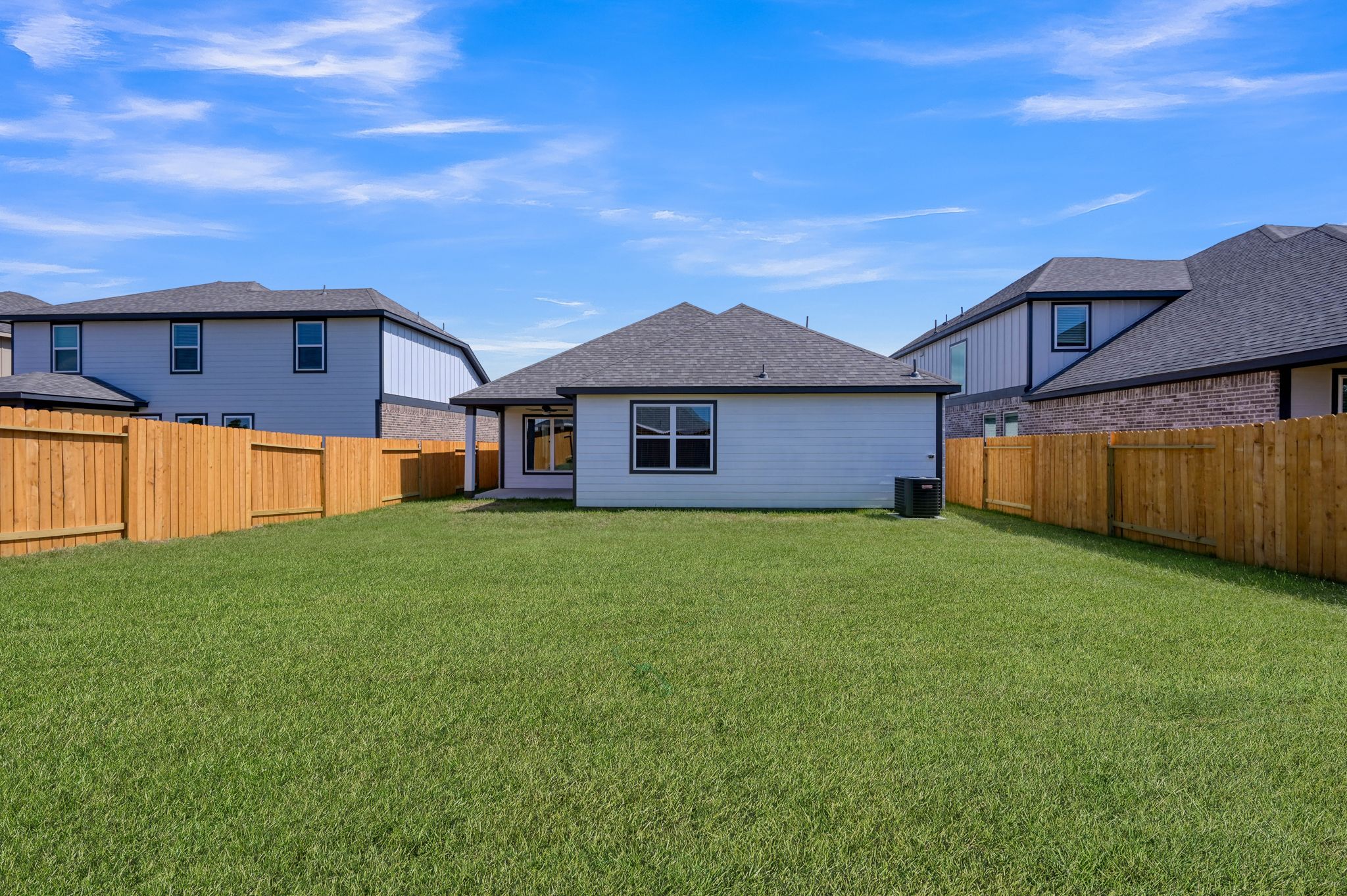 A generously sized backyard ready for outdoor enjoyment.