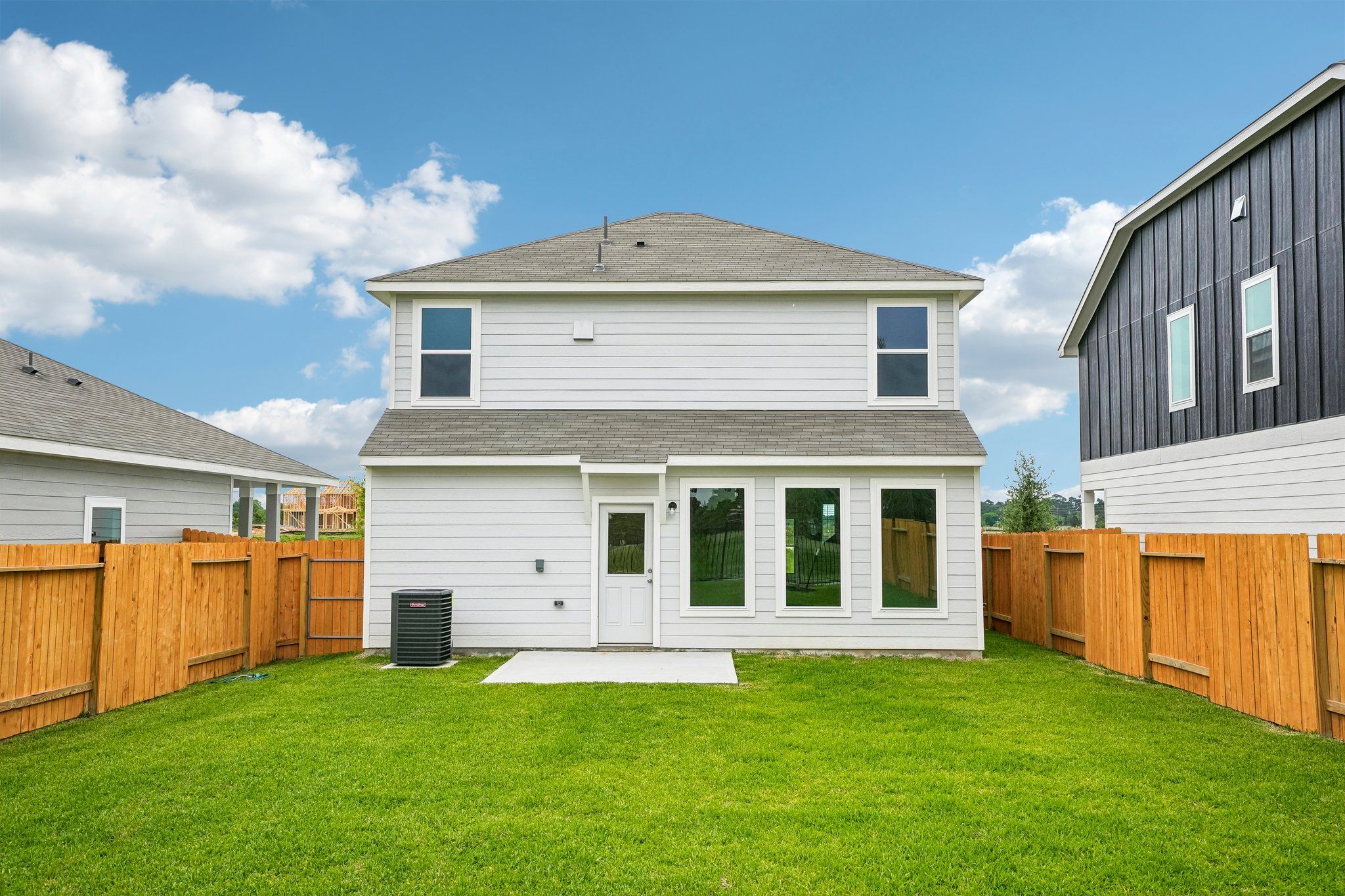 A generously sized backyard ready for outdoor enjoyment.