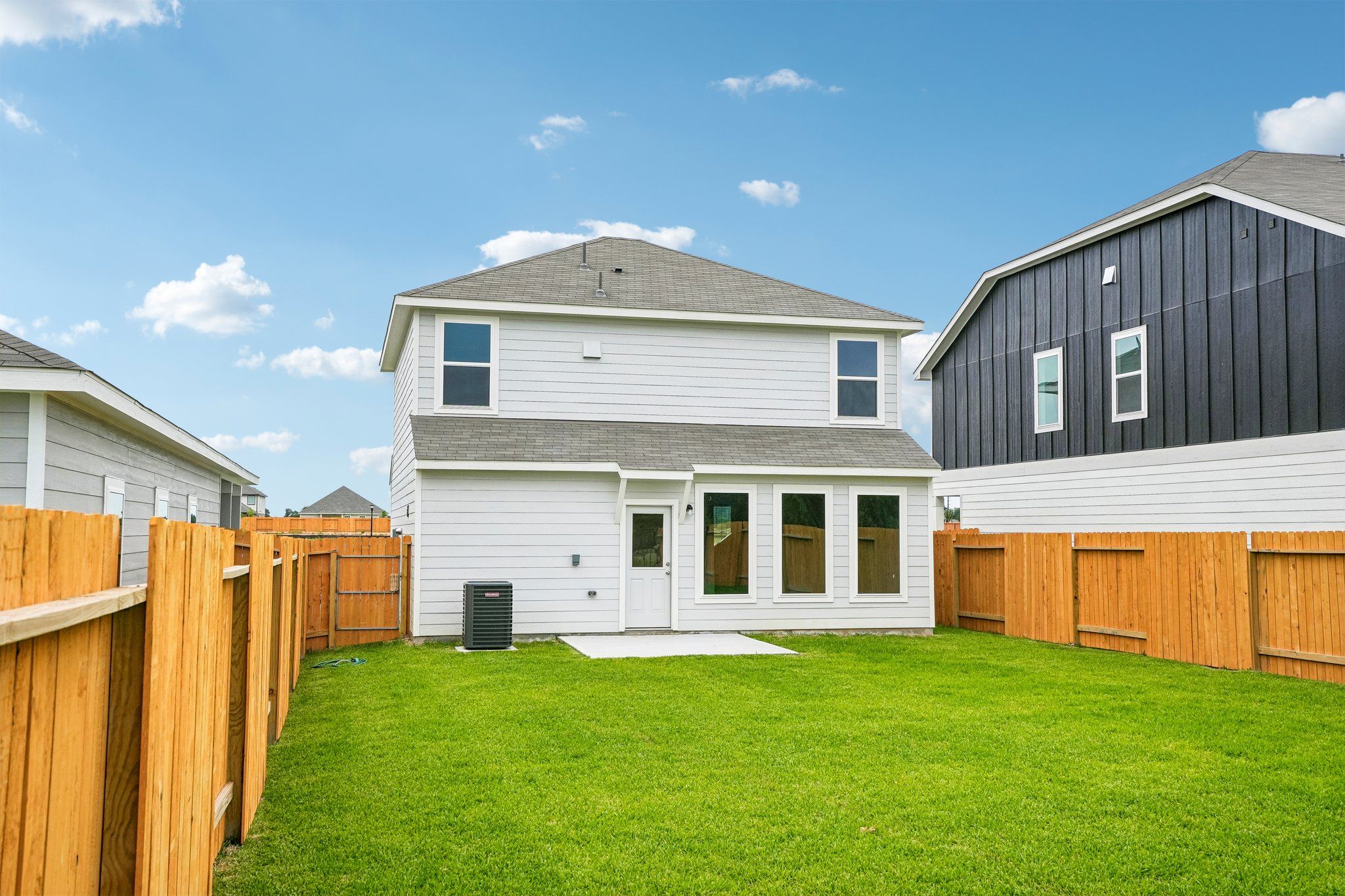 A generously sized backyard ready for outdoor enjoyment.