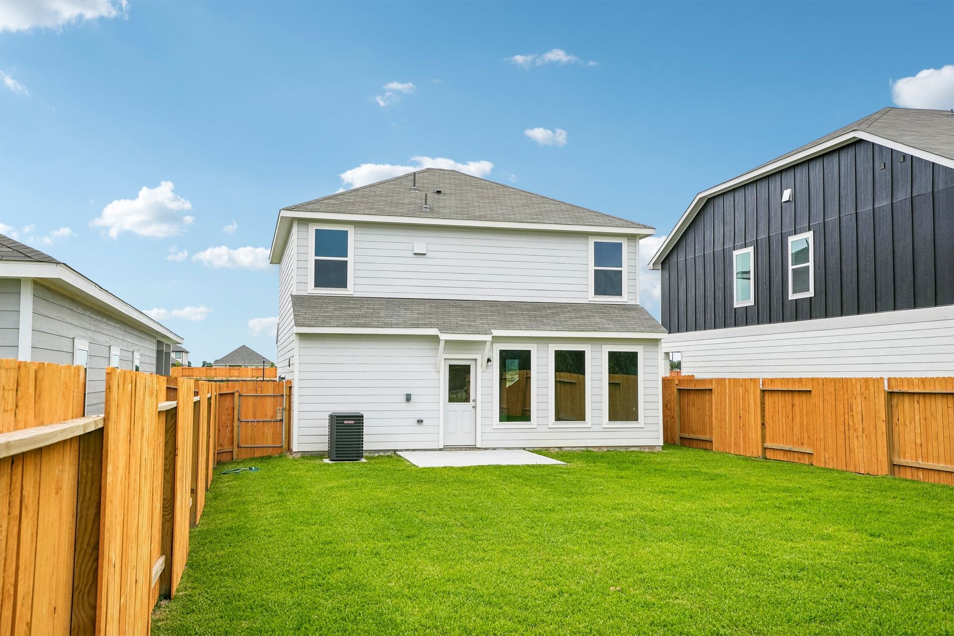A generously sized backyard ready for outdoor enjoyment.