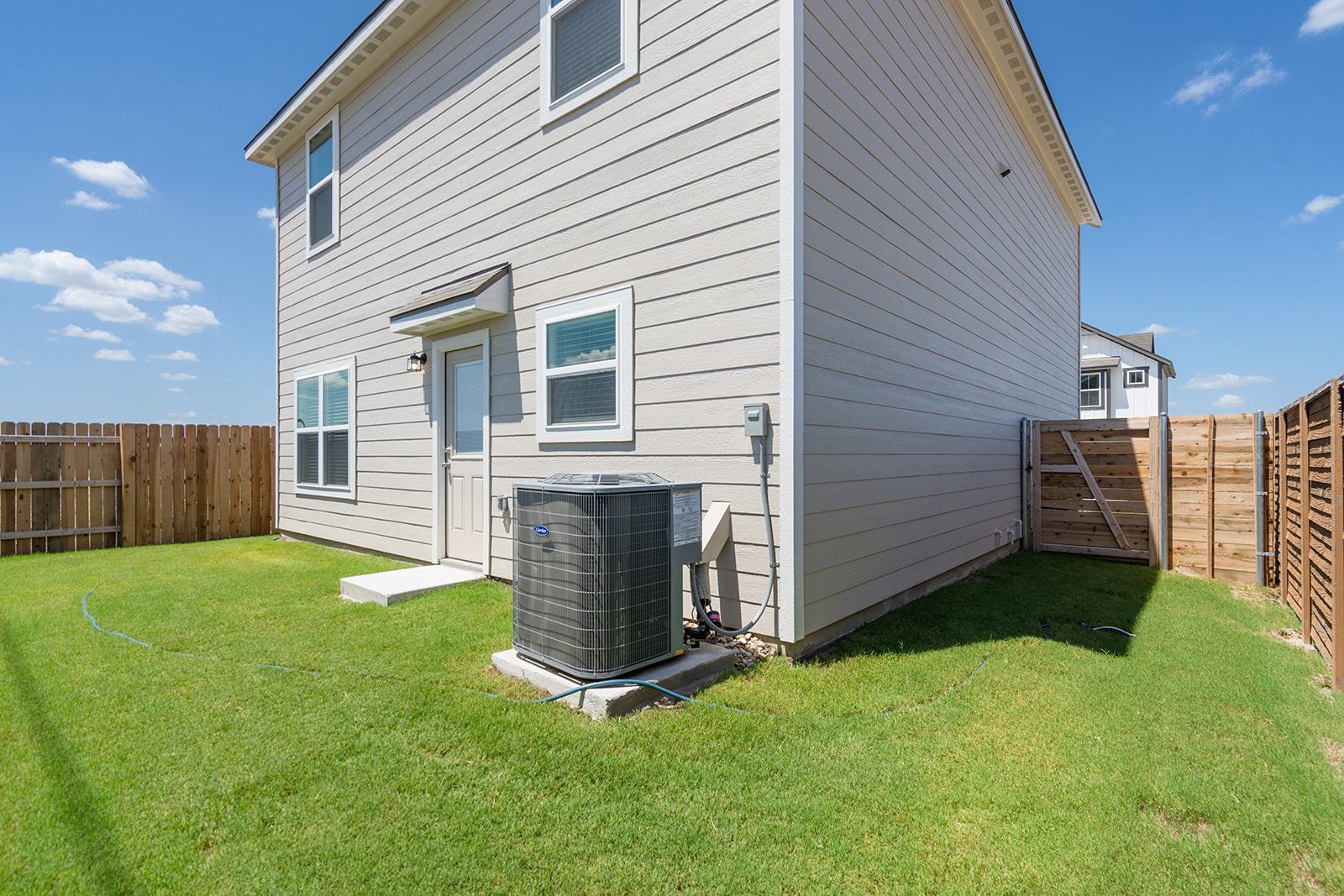 A generously sized backyard ready for outdoor enjoyment.