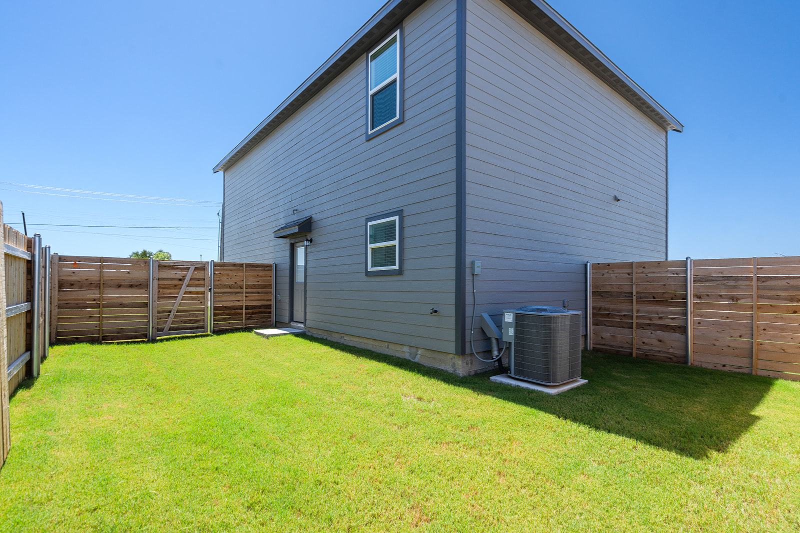 A generously sized backyard ready for outdoor enjoyment.