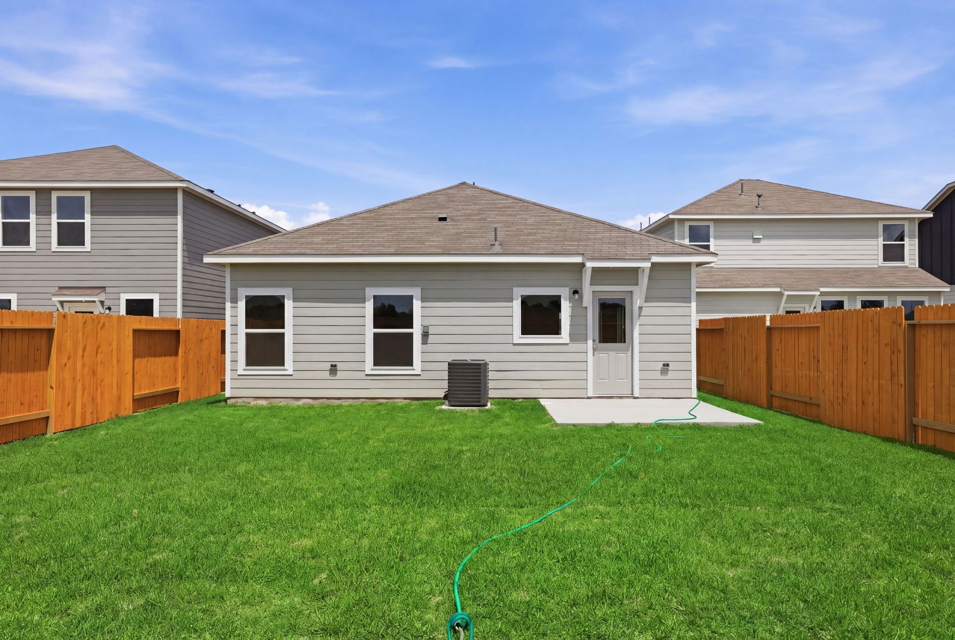 A generously sized backyard ready for outdoor enjoyment.