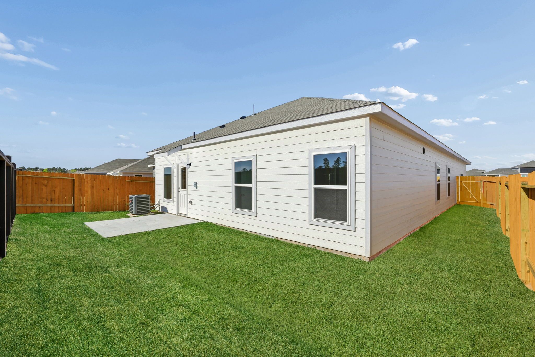 A generously sized backyard ready for outdoor enjoyment.
