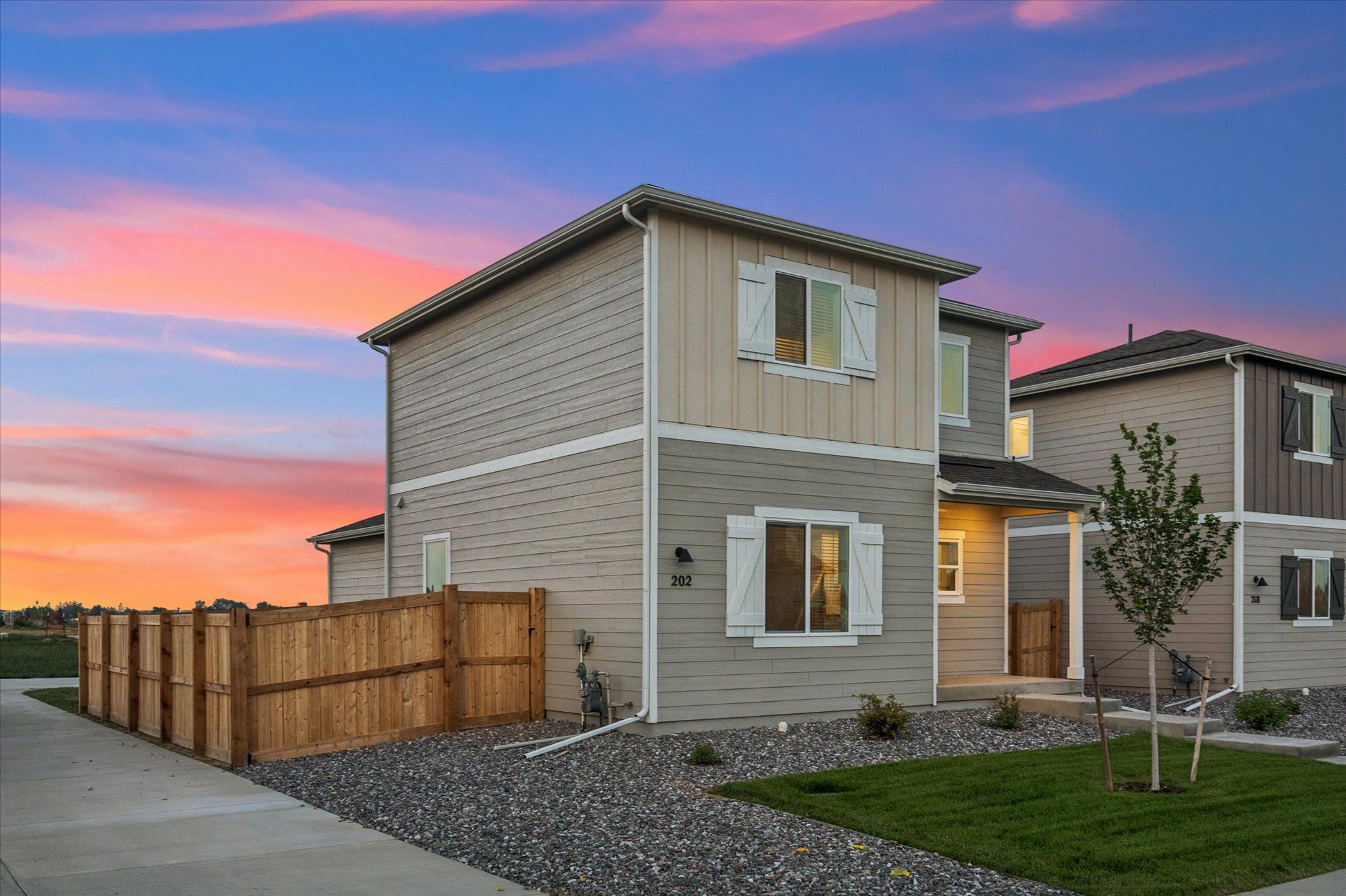 The Carnation includes a landscaped front lawn and full back fence.