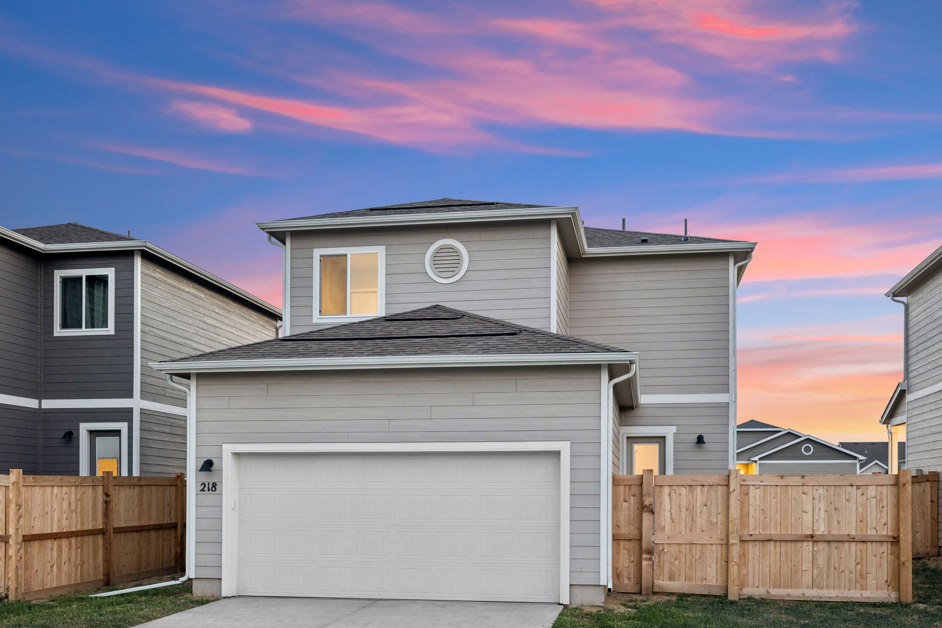 The garage is conveniently located in the back of the home.