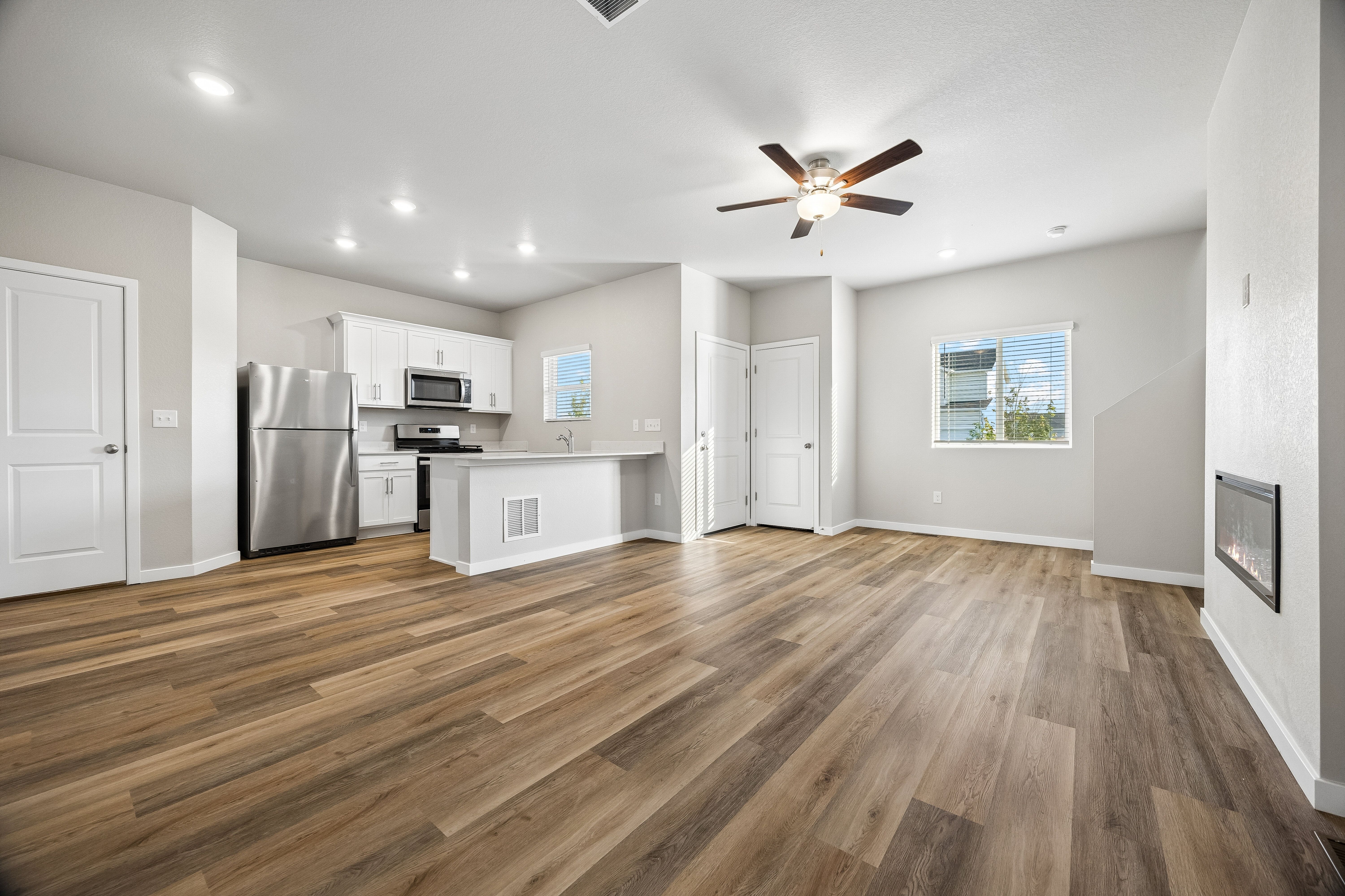 The kitchen opens to the family room for seamless hosting and memory making!