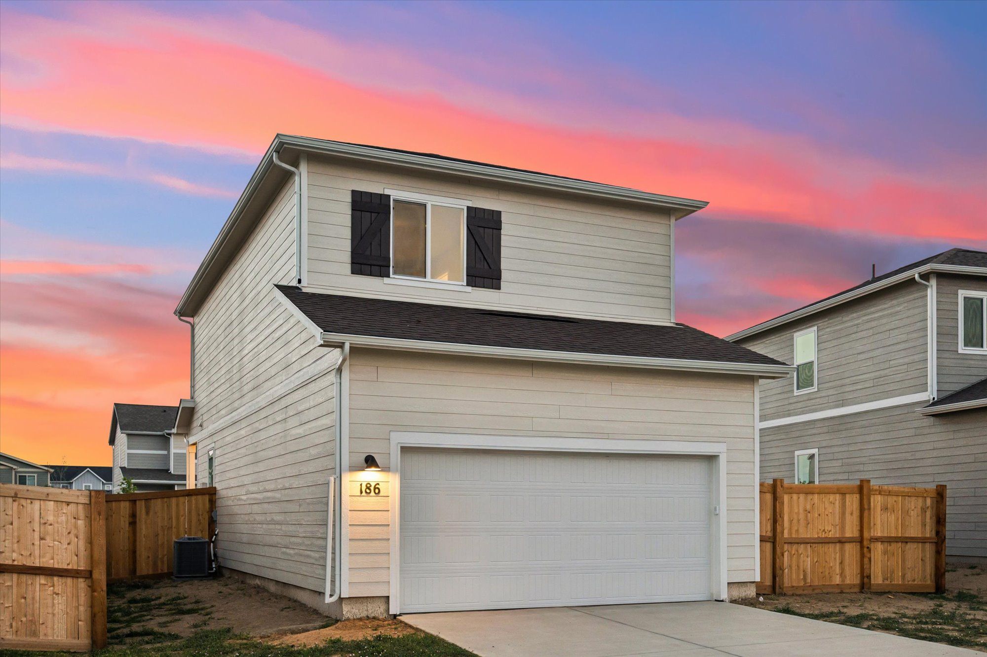 The garage is conveniently located in the back of the home.