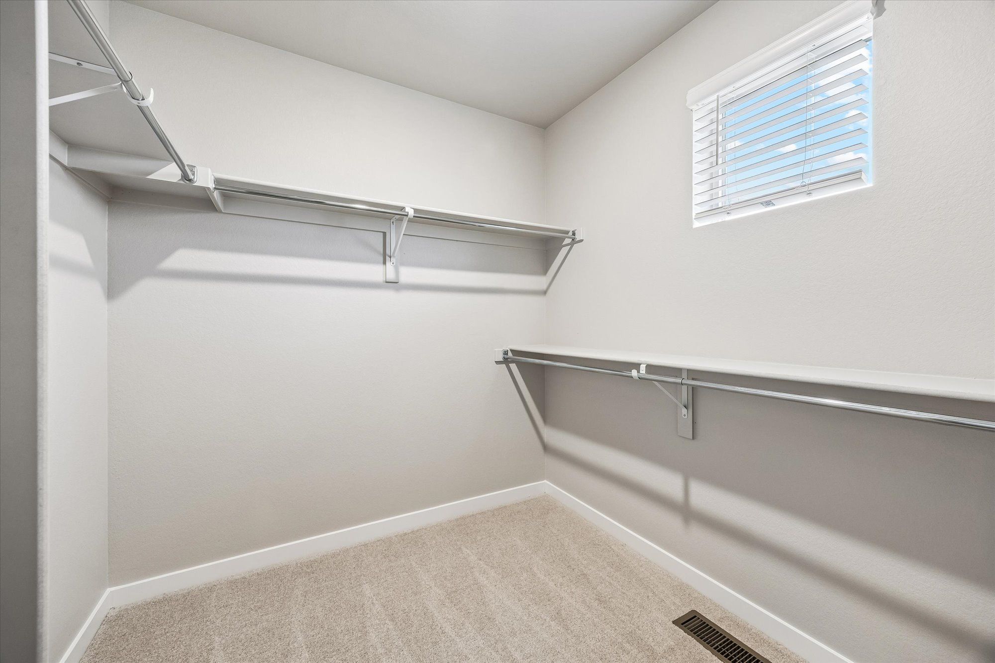 Enjoy a spacious walk-in closet in the primary suite