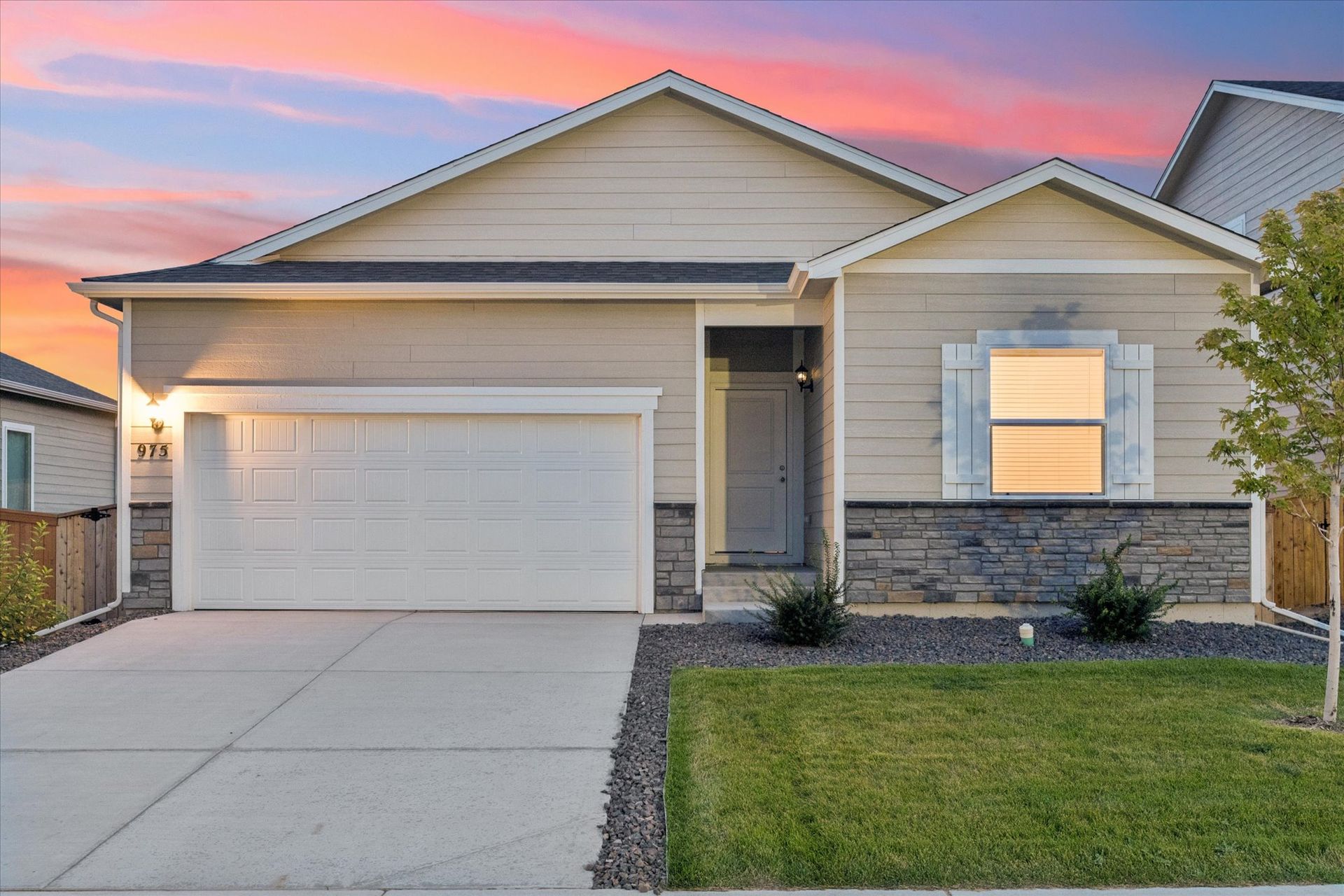 The Chatfield plan features a two-car garage