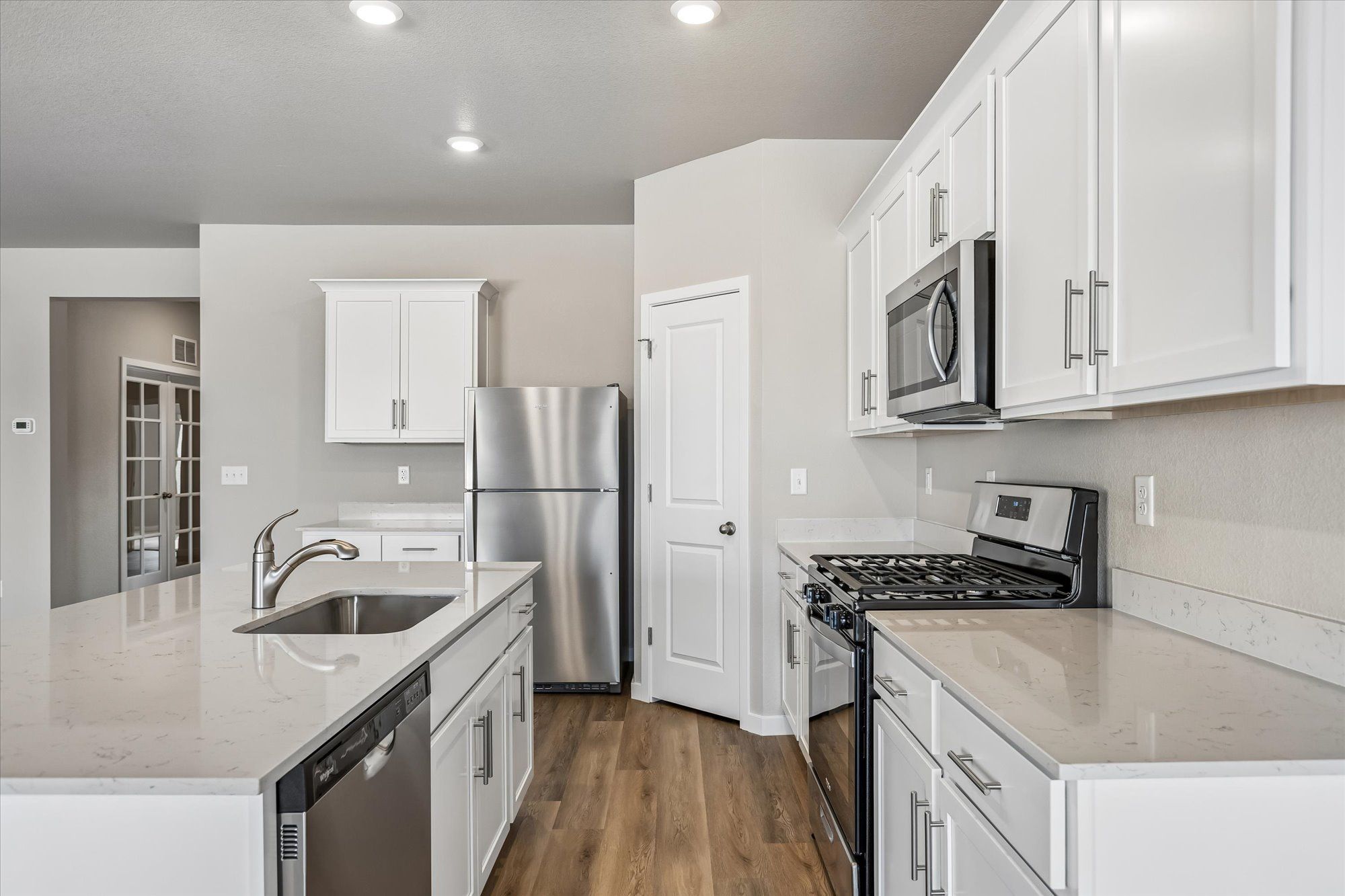 The kitchen in the Pike has beautiful, granite countertops.