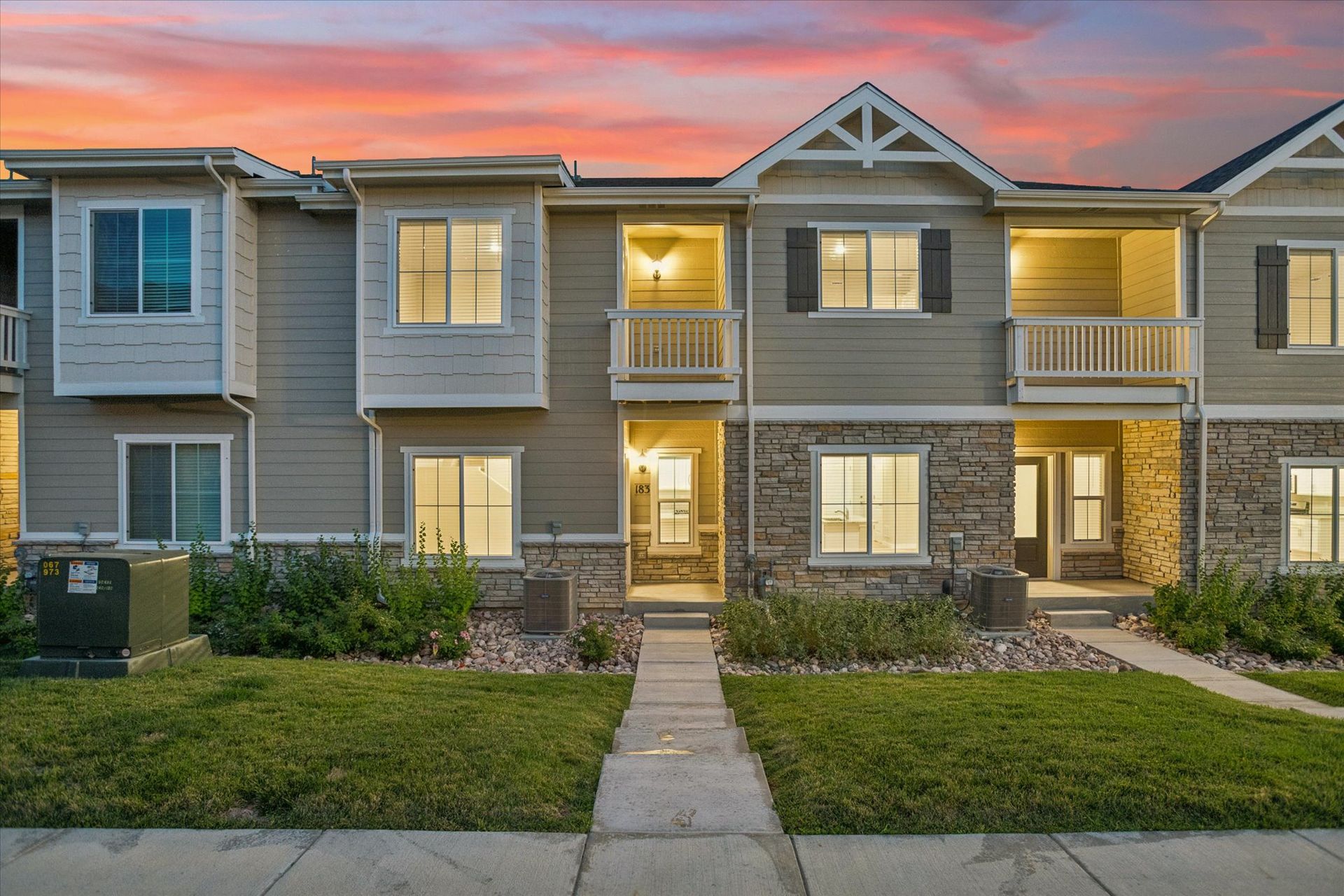 The Loveland is a beautiful two story home with siding and stone.