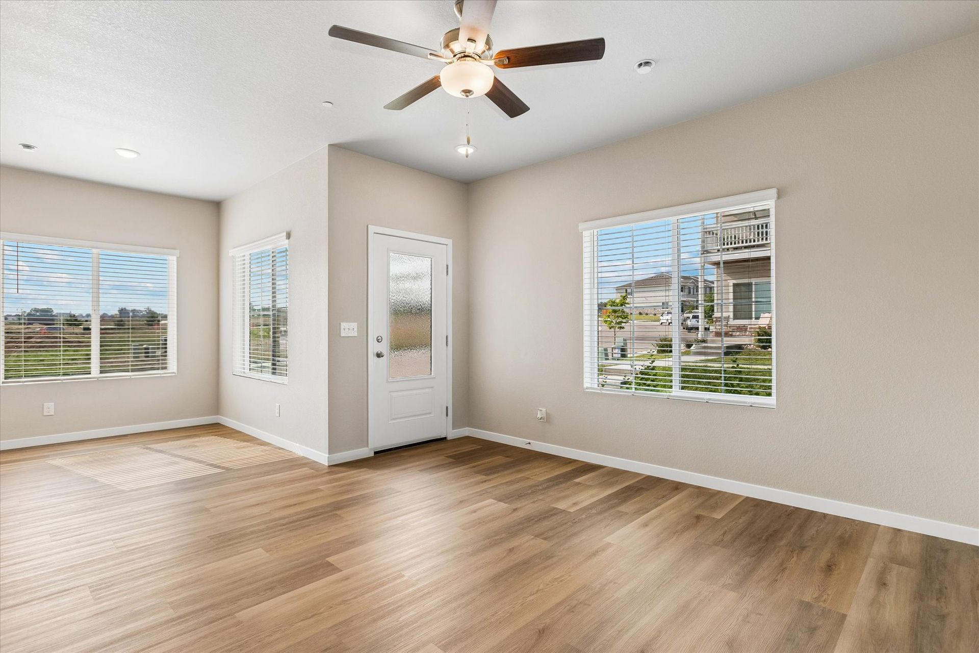 The first floor is spacious with a family room and a dining area.