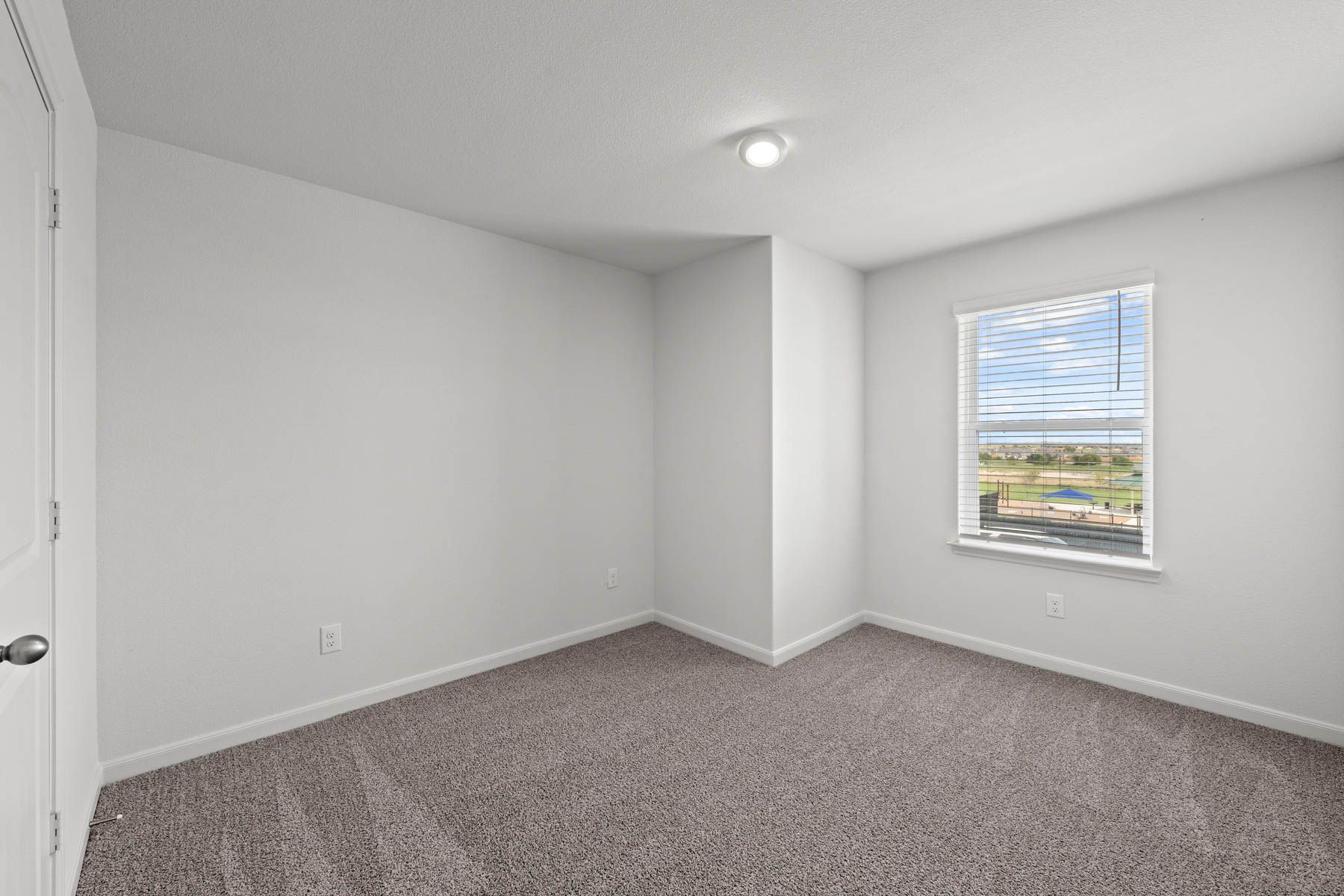 Spacious bedroom great for the kids or guest.  