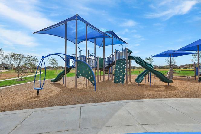 Freeman Ranch has a large playground with slides and monkey bars!