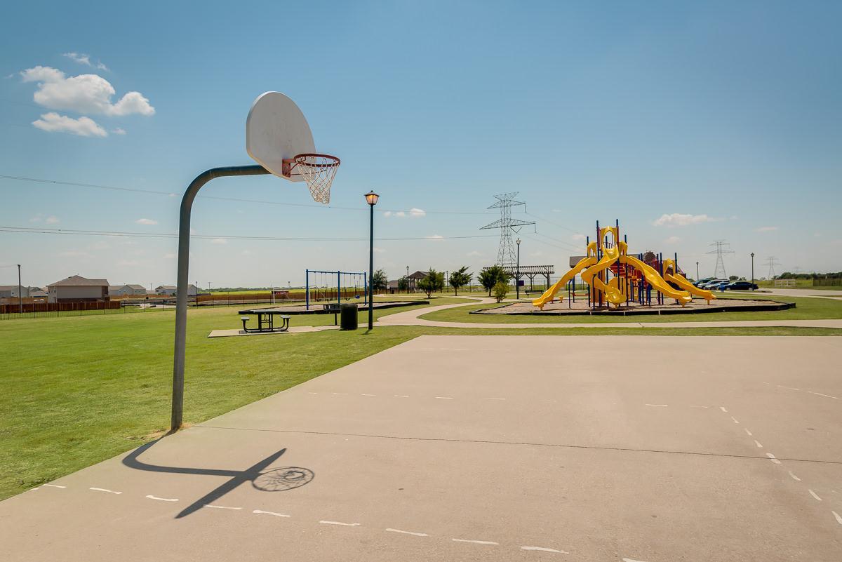 The community park features a basketball court!