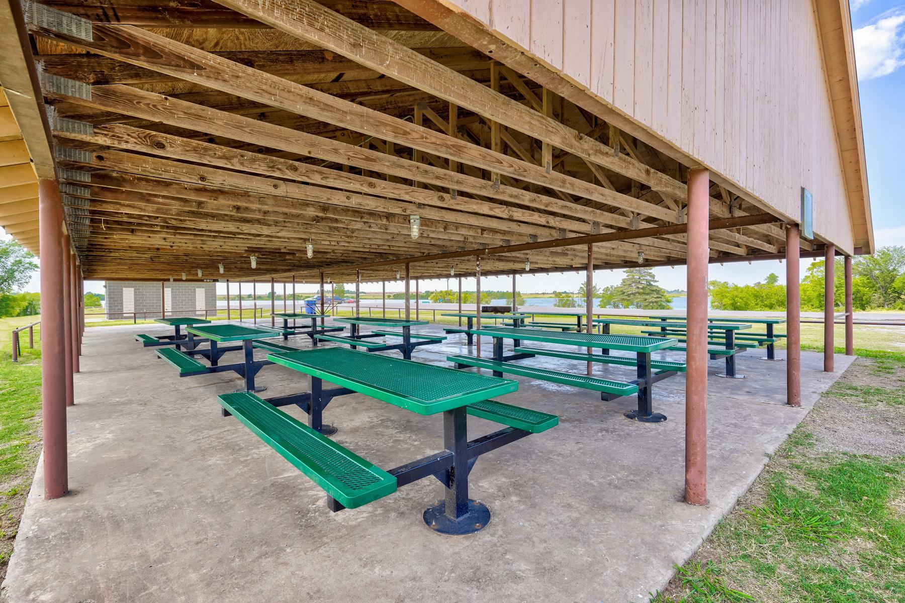 A covered picnic area perfect for a shaded lunch at the park.
